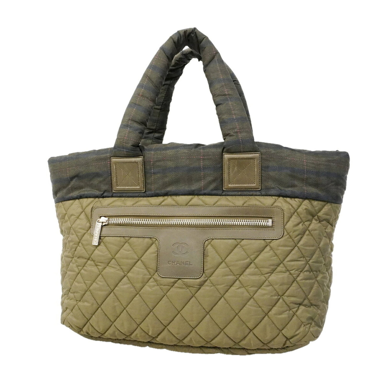Nylon Handbag Chanel: Nylon Handbag Chanel Nylon Handbag Chanel - A Khaki Colorful Classic. This Chanel handbag is made from high-quality nylon and features a unique khaki color. Its silver hardware adds a touch of