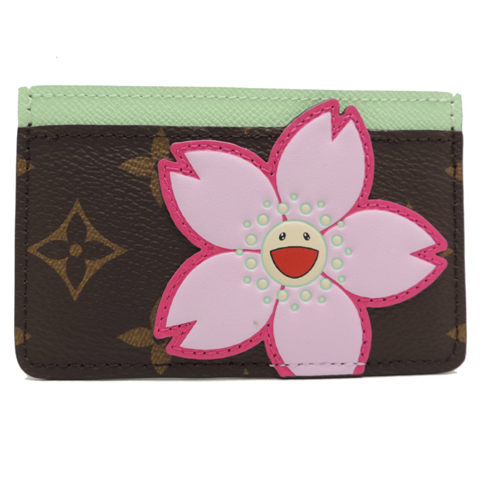 Louis Vuitton Card Case Monogram: Louis Vuitton Card Case Monogram The Louis Vuitton Card Case Monogram is a stylish accessory featuring the iconic monogram pattern, crafted from high-quality materials. Measuring 7cm x 11cm x 5mm,
