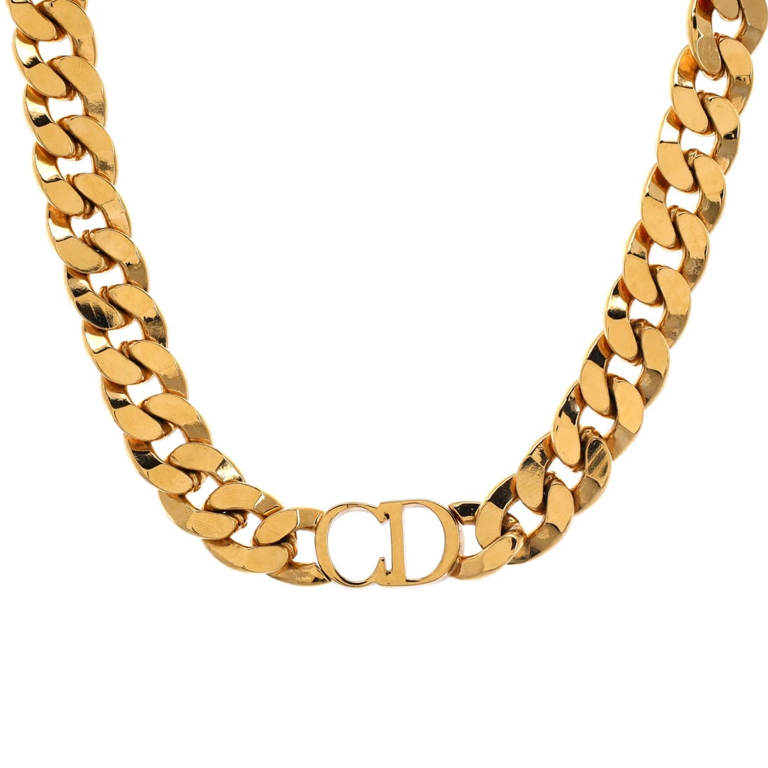 Metal Dior Choker Necklace Etoile Danseuse Christian: Metal Dior Choker Necklace Etoile Danseuse Christian The Metal Dior Choker Necklace Etoile Danseuse features a gold metal exterior and a unique design that showcases the iconic Danseuse Etoile motif,