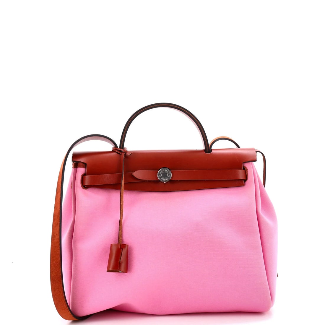 Herbag Hermes Leather Toile 31 Zip: Herbag Hermes Leather Toile 31 Zip The Herbag Hermes Leather Toile 31 Zip is a unique and stylish shoulder bag featuring a pink exterior with a canvas interior. Its distinctive Toile 31 design and