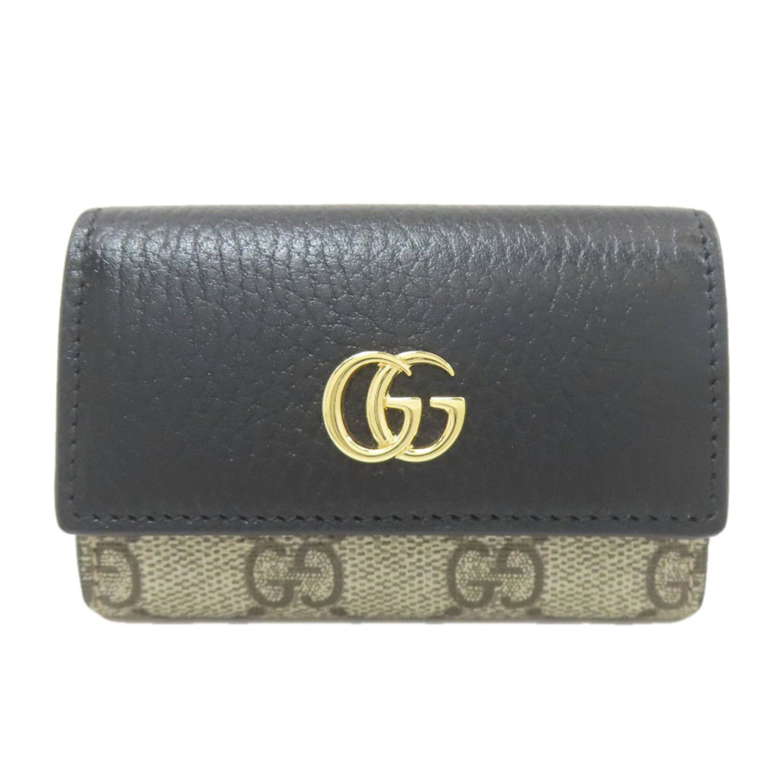 Pvc keycase gucci: Pvc keycase gucci The Gucci PVC keycase is a compact, brown accessory with a size of 7cm x 9.5cm x 2cm, making it a convenient addition to any bag or purse. Its durable PVC material ensures