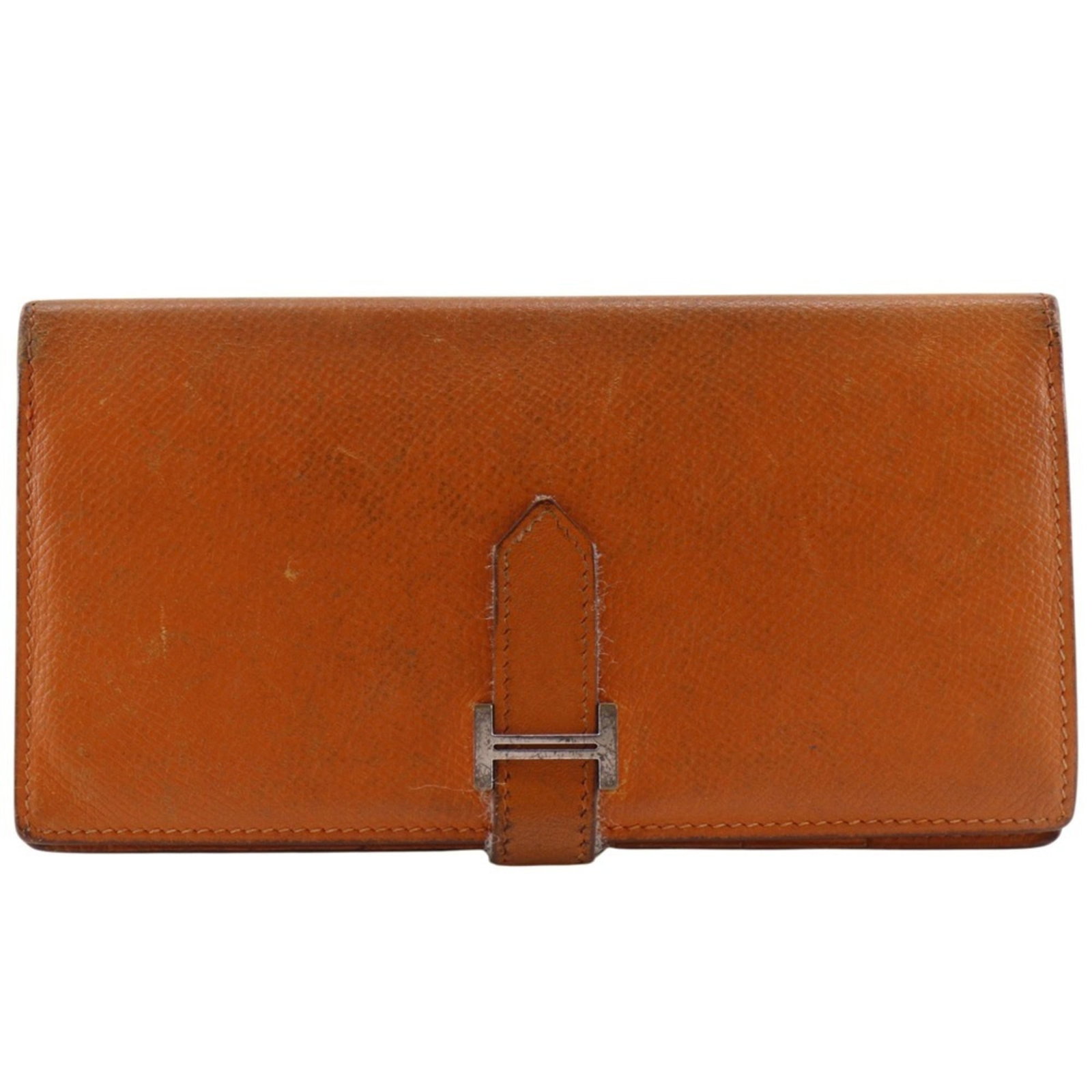 Epsom Leather Bi fold Wallet Hermes: Epsom Leather Bi fold Wallet Hermes Epsom leather bi-fold wallet from Hermes, with a vibrant orange color and sleek design. Measuring 9.5cm x 17.5cm x 1cm, this long wallet is crafted from