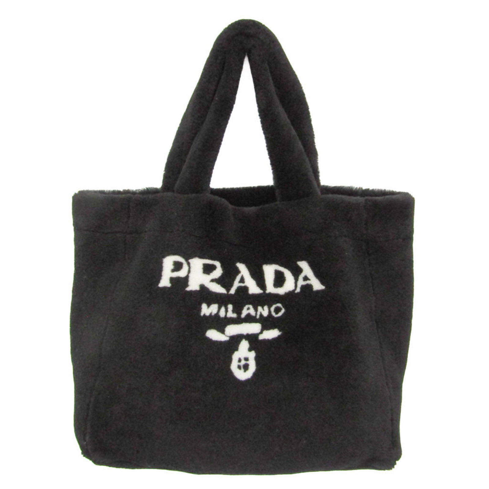 Tote Bag Fur Prada: Tote Bag Fur Prada Prada's Montone fur tote bag boasts a sleek design with a spacious pouch size of H18 x W23cm. Crafted from luxurious fur, this stylish tote features an open closure and a practical 
