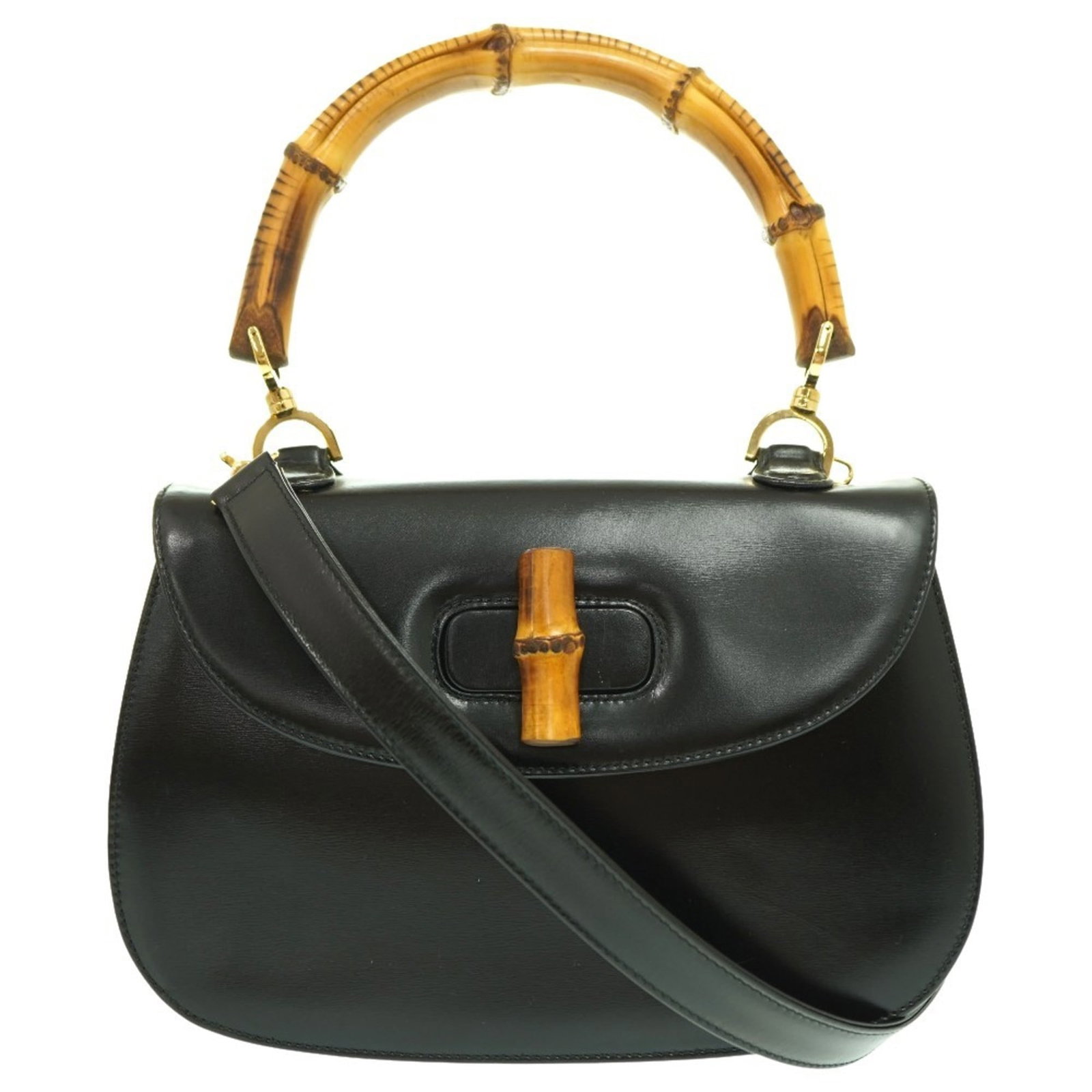Handbag Leather Gucci: Handbag Leather Gucci Black leather Gucci handbag with a shoulder strap, measuring 18cm x 26.5cm x 7.5cm. This handbag features high-quality leather construction and a classic design. Item Specifics: