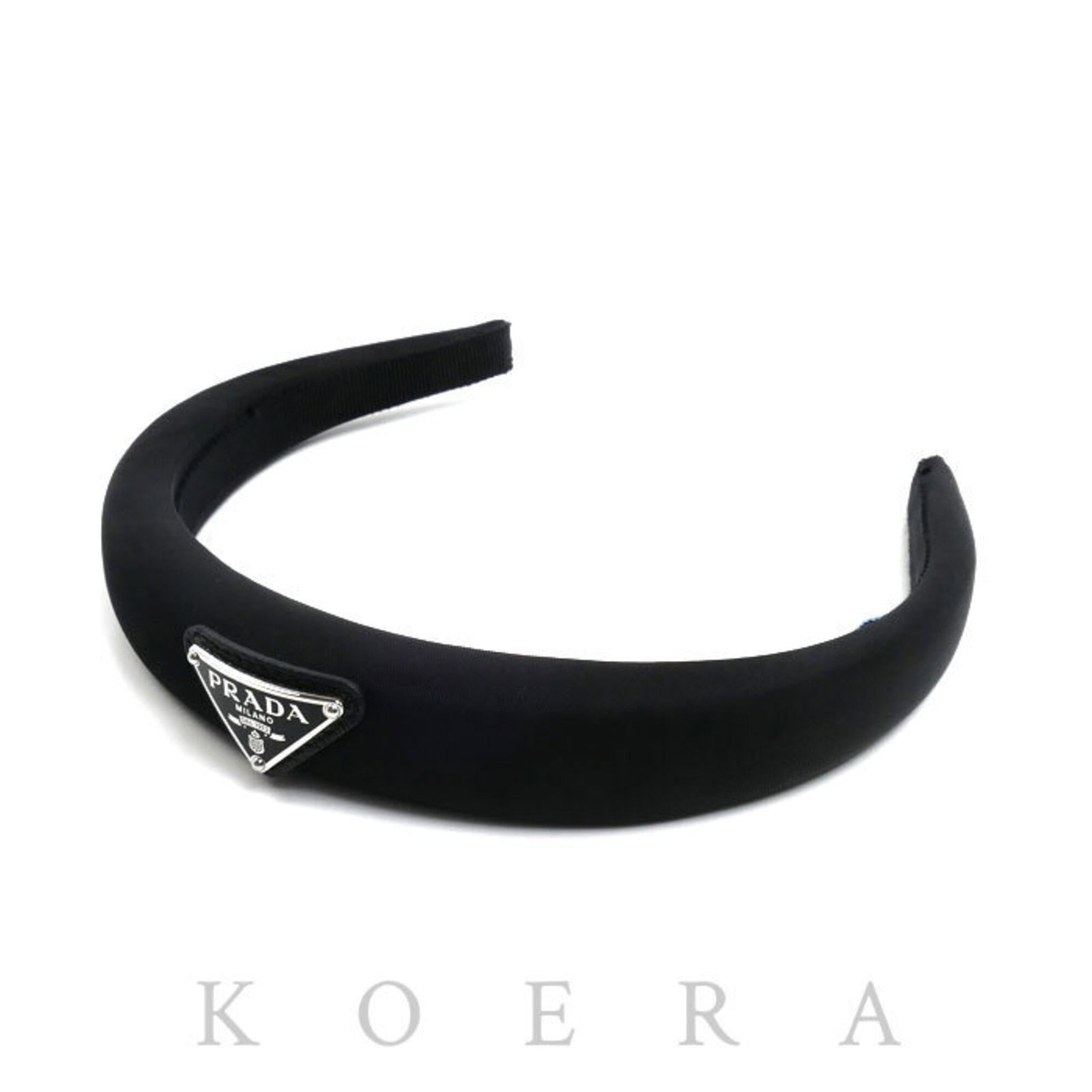 Alice Band: Alice Band Black Alice band from Prada, measuring 2.6cm in length and 1.02 inches in width. Made in Italy, this accessory features a sleek design. A signature is present on the band. Item Specifics: B