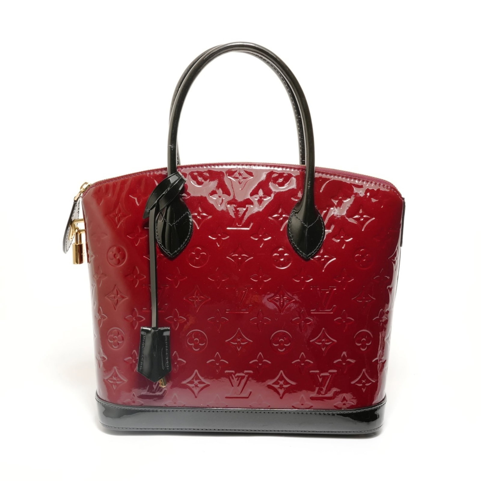 Vuitton Handbag Monogram Vernis Louis: Vuitton Handbag Monogram Vernis Louis Vuitton's iconic Monogram Vernis Louis handbag boasts a striking red color and timeless design, perfectly balanced by its sleek 26cm x 33cm x 14cm dimensions. The
