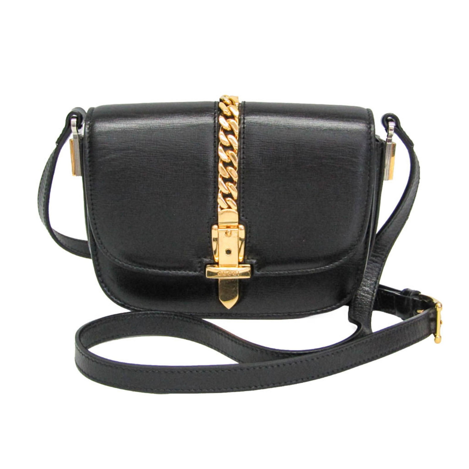 Shoulder Bag Leather: Shoulder Bag Leather Black leather shoulder bag from the Gucci Sylvie line, featuring a turn lock closure and measuring 14cm x 18cm x 4cm. The bag bears a signature and is made from high-quality leath