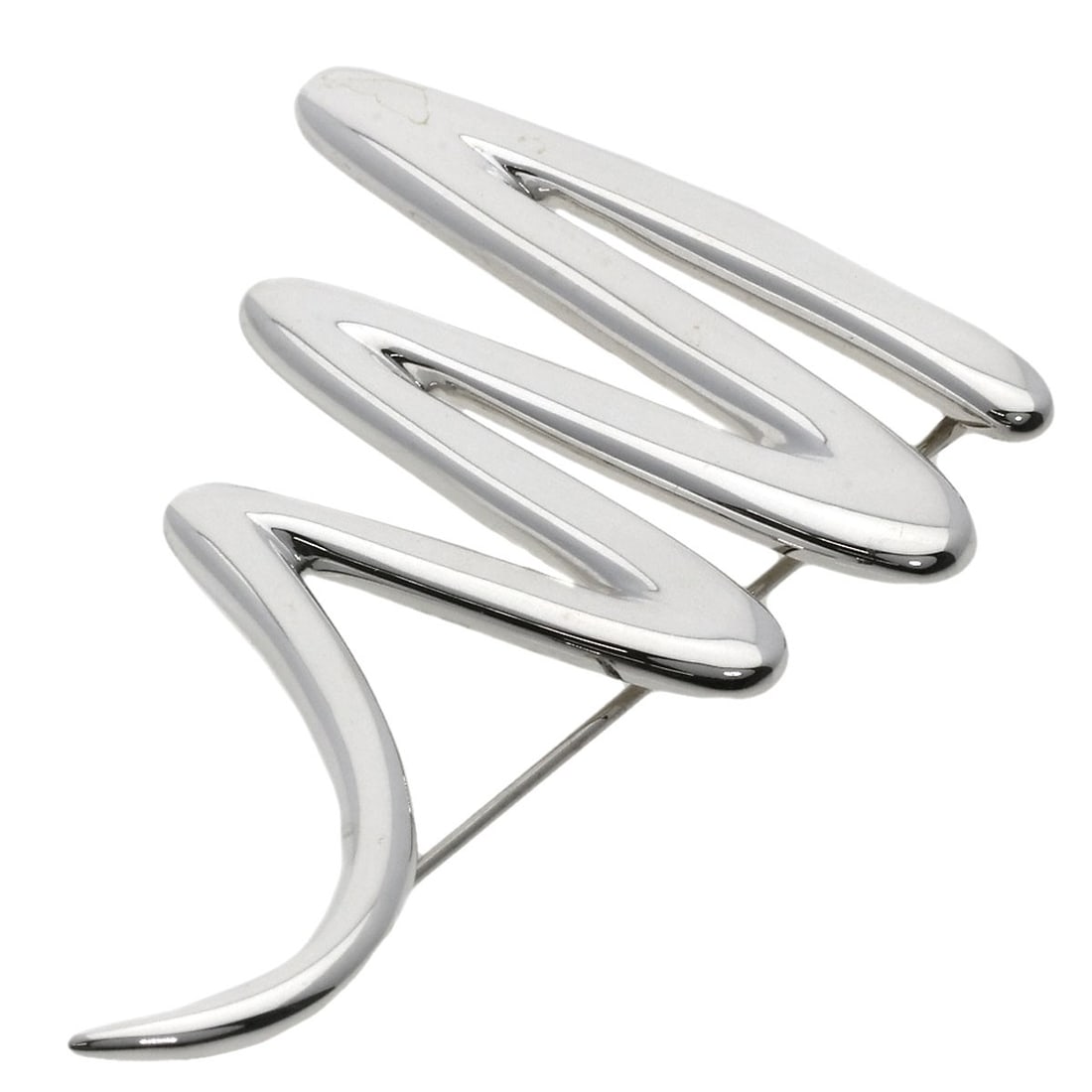 Tiffany Co Scribble Silver Brooch: Tiffany Co Scribble Silver Brooch Silver Scribble Brooch by Tiffany & Co. features a striking silver design. The brooch bears a signature, adding a touch of elegance to any outfit. Its sleek silver