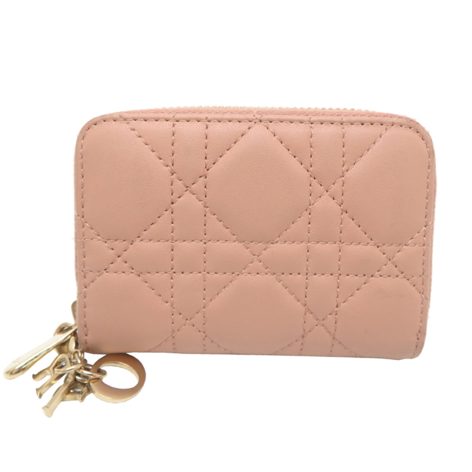 Dior Christian Coin Leather Purse: Dior Christian Coin Leather Purse The Dior Christian Coin Leather Purse is a stylish and elegant accessory, crafted from luxurious lambskin leather. Its sleek design and soft pink hue make it a chic a