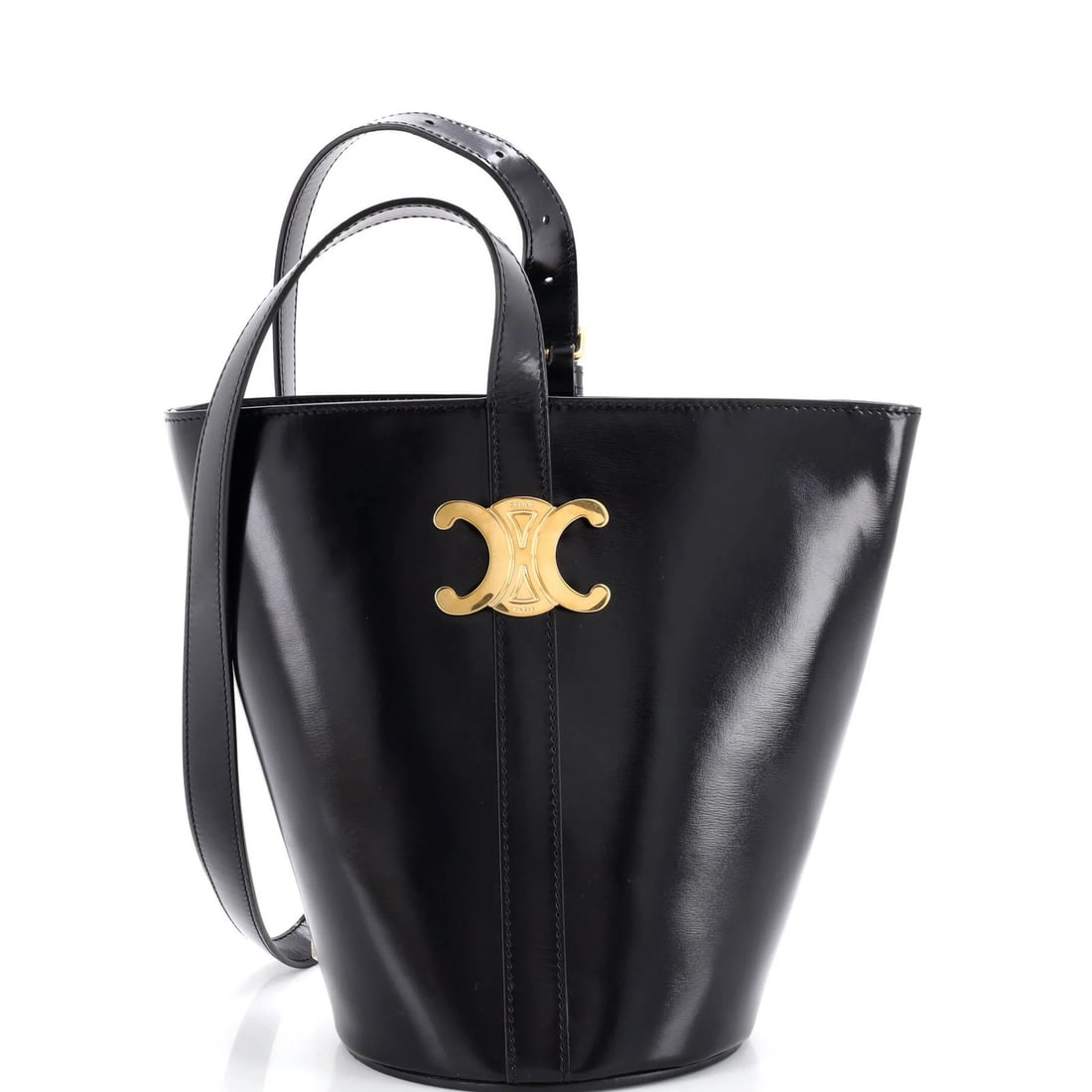 Triomph Small Leather Bucket Bag Celine: Triomph Small Leather Bucket Bag Celine Small, sleek, and stylish, this black leather bucket bag from Celine features a classic design with gold hardware. Measuring 8.5" tall, 5.5" wide, and 5.5"