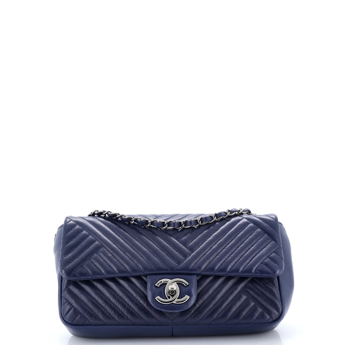 Chanel Crossing Chevron Lambskin Medium Flap Bag: Chanel Crossing Chevron Lambskin Medium Flap Bag Blue Chevron Lambskin Medium Flap Bag in Excellent Condition. This stylish Chanel Crossing Chevron Lambskin Medium Flap Bag boasts a classic design