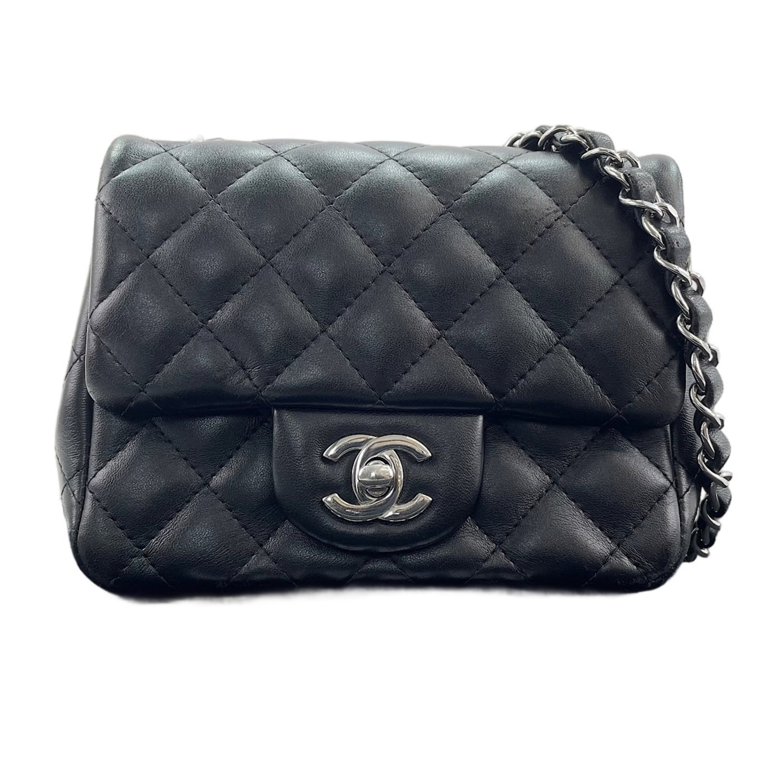 Shoulder Bag by Chanel: Shoulder Bag by Chanel Black Chanel shoulder bag with dimensions 13cm x 16cm x 7cm. This sleek and classic design is a timeless addition to any wardrobe. Made from high-quality materials, its compact 