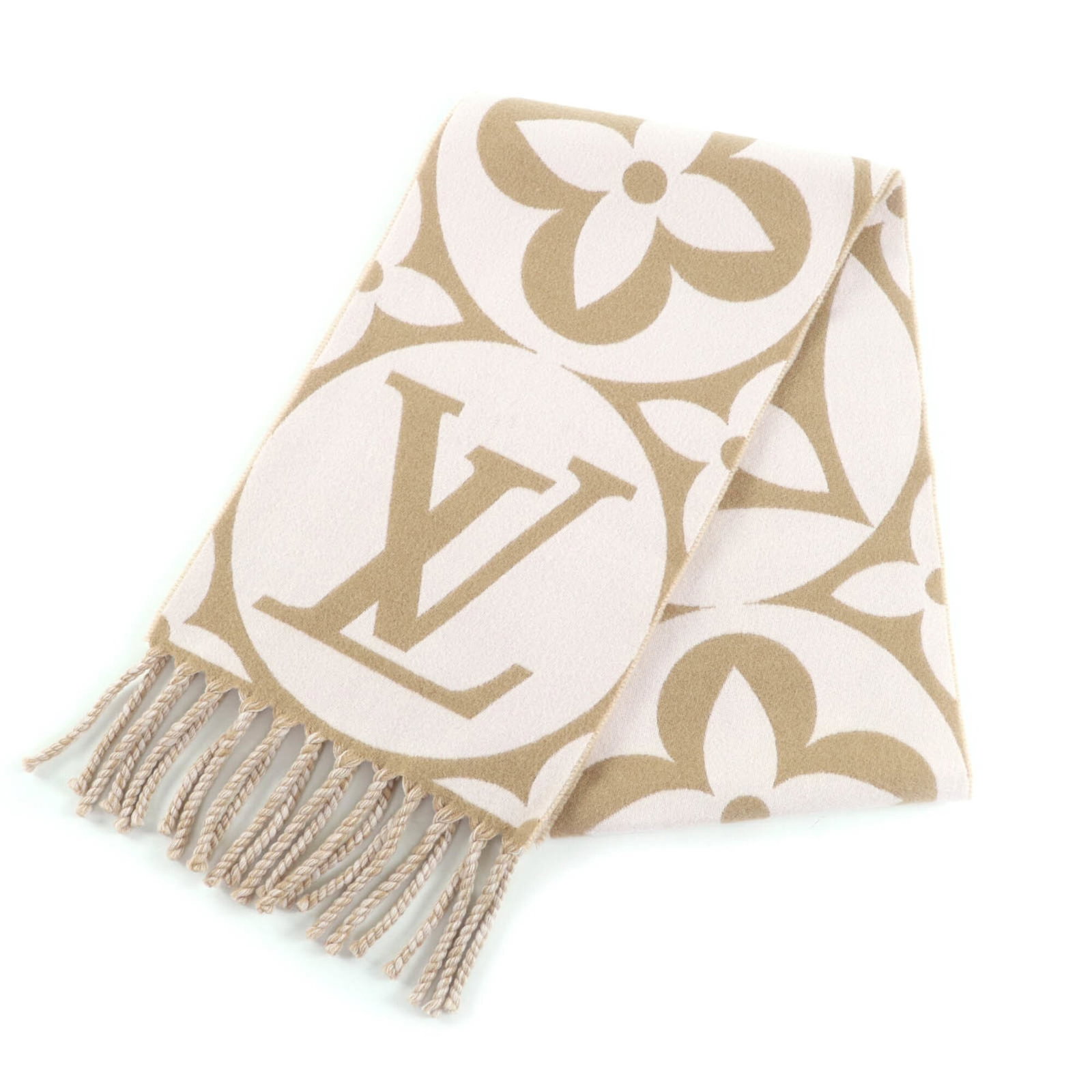 Stole Louis Vuitton Wool 100%: Stole Louis Vuitton Wool 100% Stole from Louis Vuitton, this 100% wool piece boasts a classic beige color and elegant design. Made from the finest Italian wool, its 2.04m x 30cm dimensions make it a s