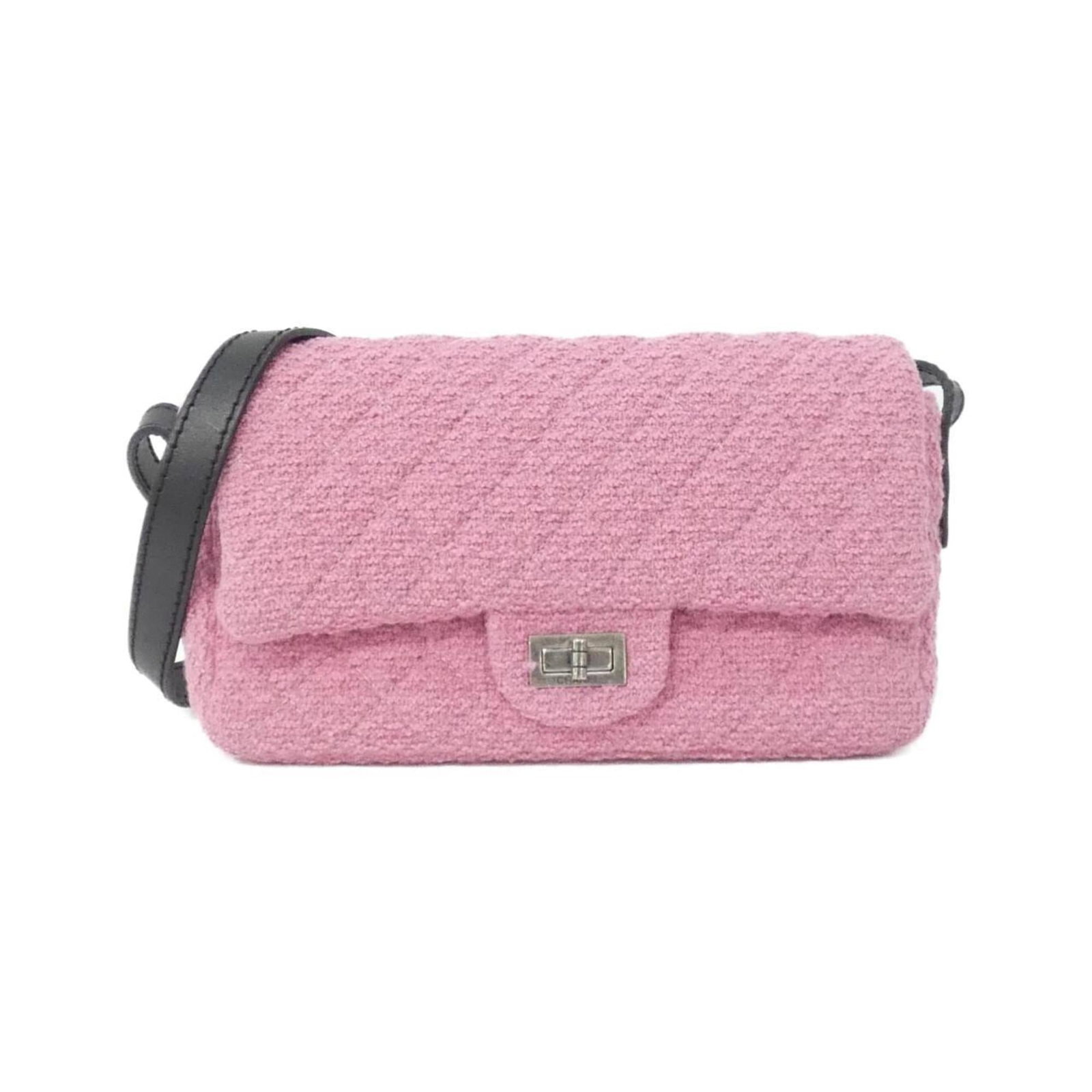 Tweed shoulder bag by Chanel: Tweed shoulder bag by Chanel Tweed shoulder bag by Chanel, featuring a pink color and compact size, measuring 14cm x 24cm x 6.5cm. This stylish bag is made from tweed material and has a sleek design.