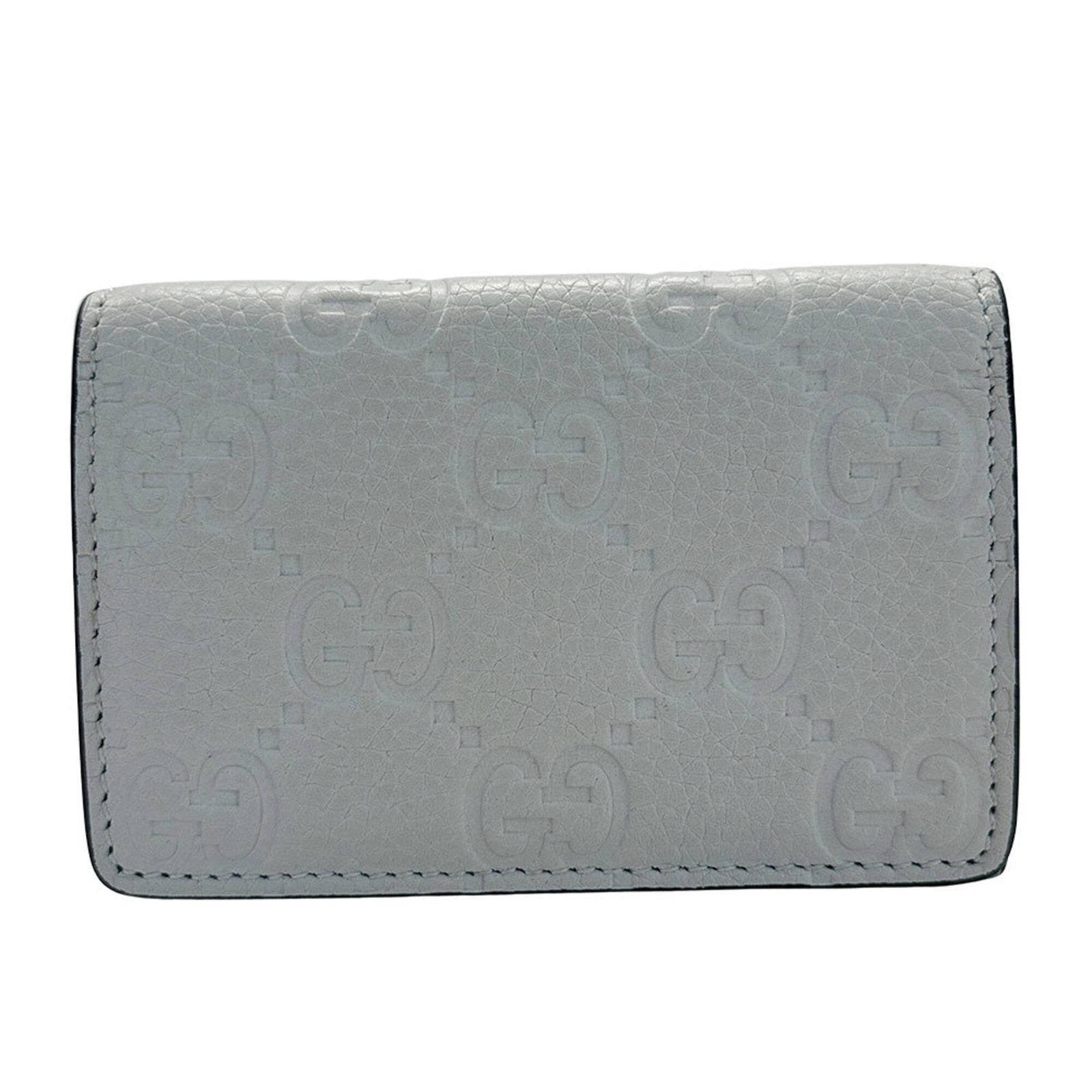 Case Card Leather Gucci: Case Card Leather Gucci This Gucci card case is crafted from high-quality leather, featuring a sleek gray color and a compact size that fits perfectly in a pocket or purse. The case measures 7.5cm x