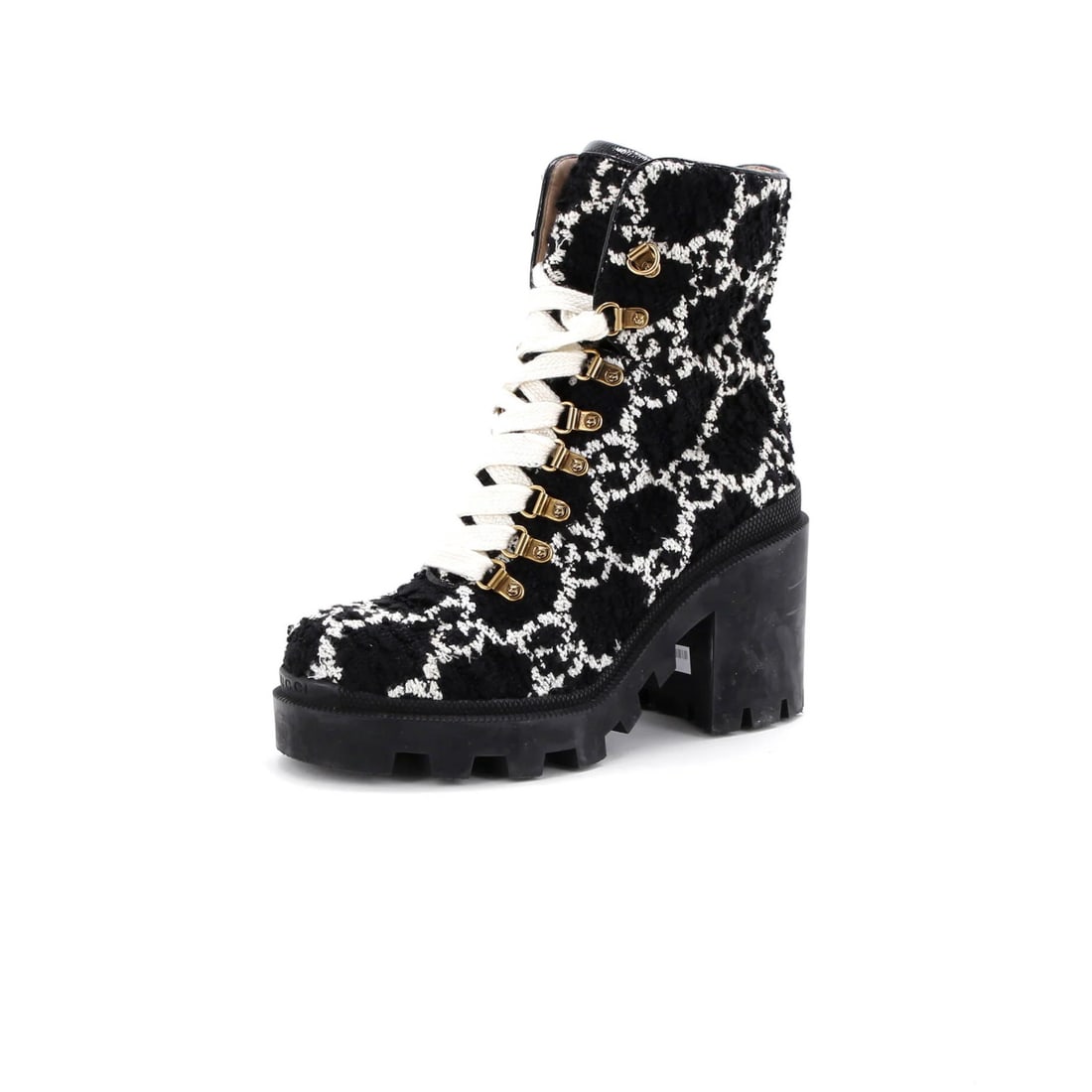 Women's Heeled Lace Combat Ankle Boots Gucci GG Tweed: Women's Heeled Lace Combat Ankle Boots Gucci GG Tweed Tweed and patent leather come together in this black and white Gucci GG Tweed combat ankle boot, featuring a heeled lace-up design. The neutral-co