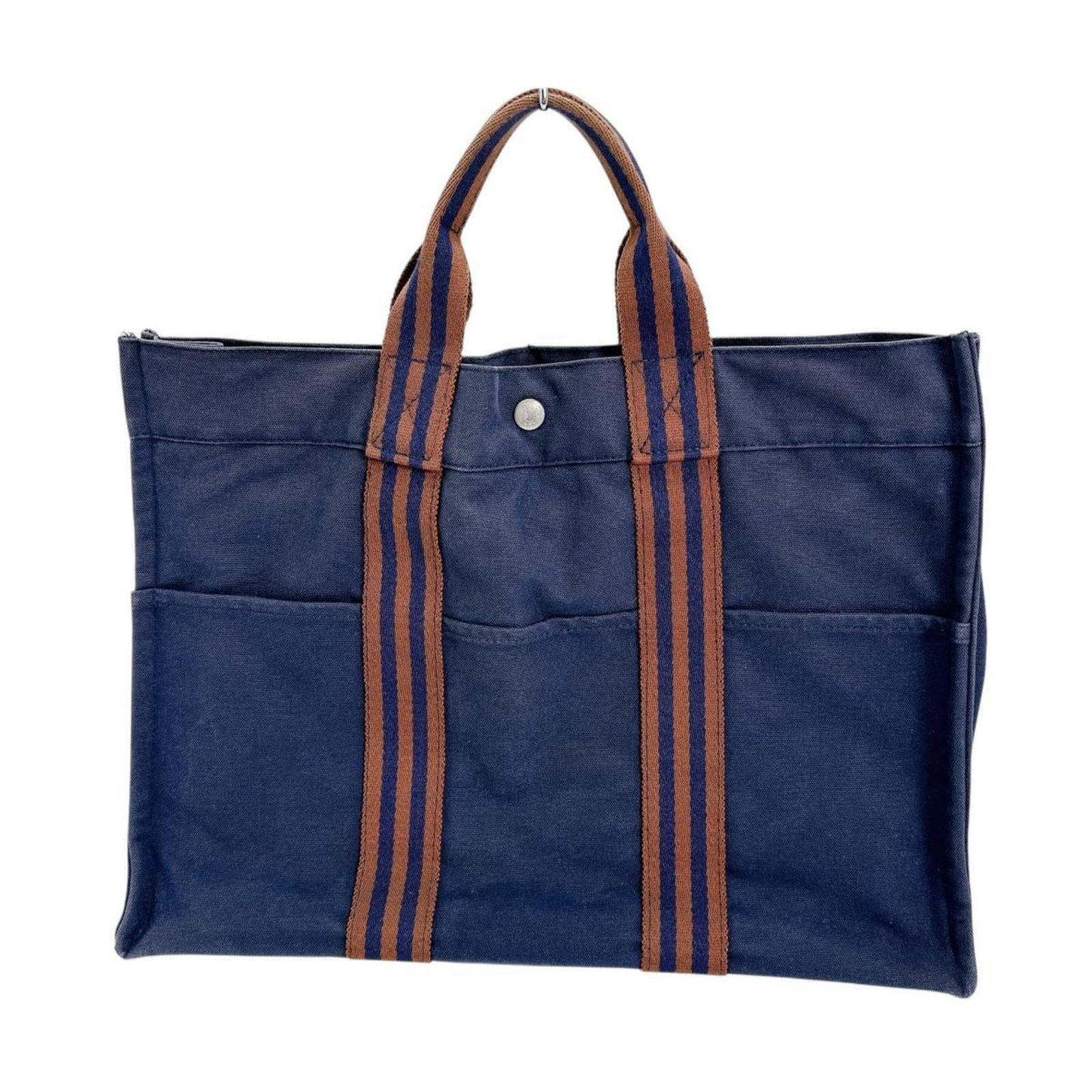 Cotton Handbag Tote Hermes: Cotton Handbag Tote Hermes Cotton Handbag Tote Hermes is made from high-quality cotton material and features a classic navy color. This stylish tote bag measures 30cm x 42cm x 10cm and has no