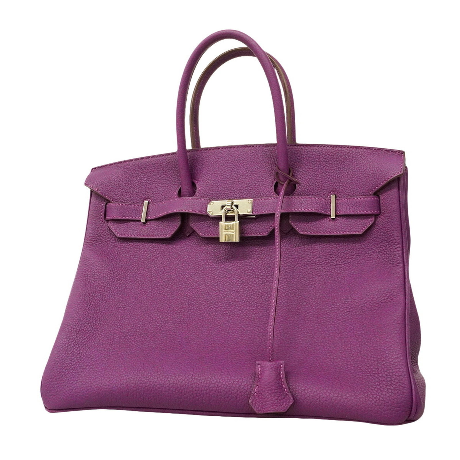 Hermes Handbag Togo Leather: Hermes Handbag Togo Leather Togo leather craftsmanship is evident in this elegant Hermes handbag, featuring an anemone color that adds a touch of sophistication to any outfit. The silver hardware adds