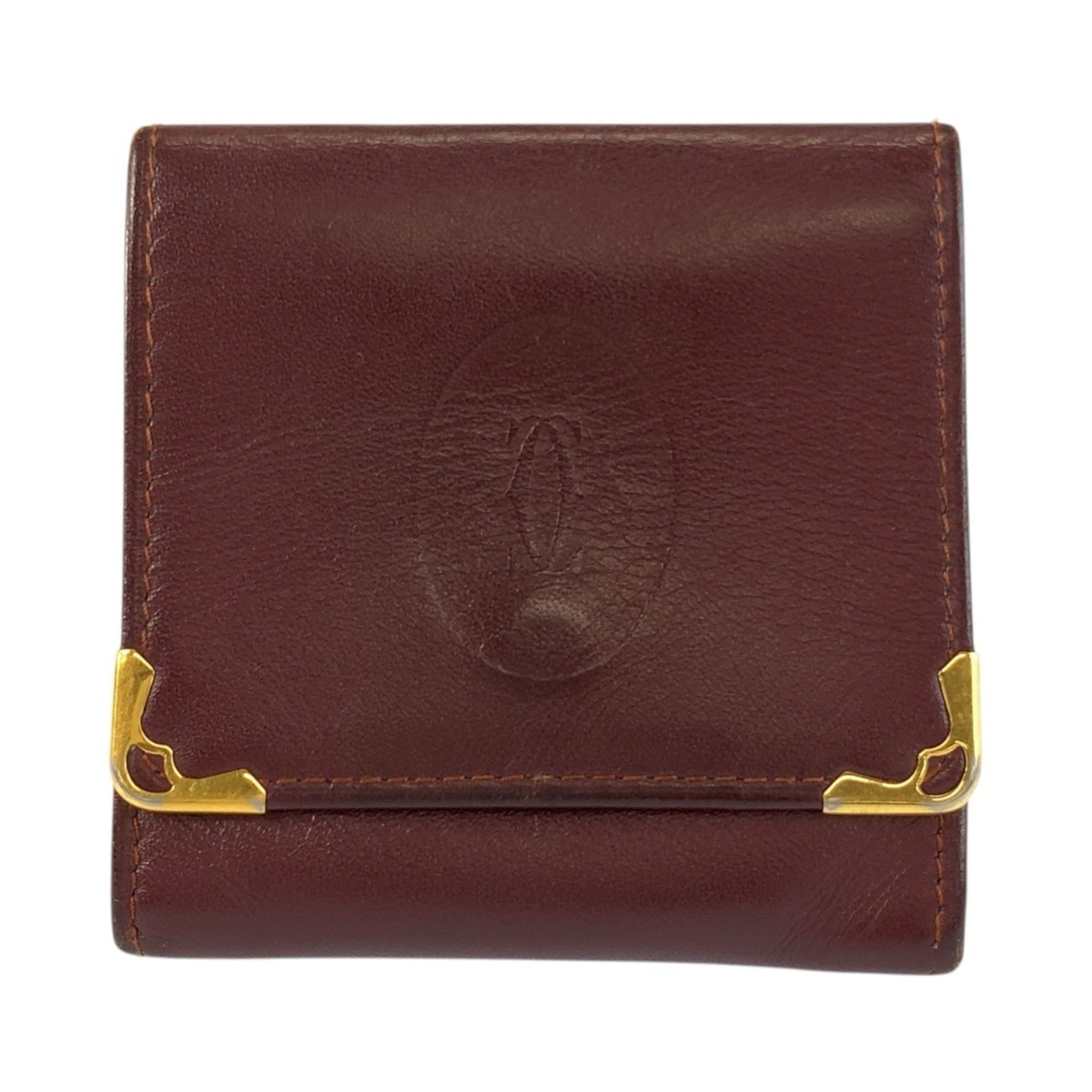 Coin Case Leather Purse Cartier: Coin Case Leather Purse Cartier Cartier's iconic leather coin case is a timeless accessory, crafted from high-quality Bordeaux leather. Measuring 8cm x 8cm x 5.00mm, this compact purse is a stylish