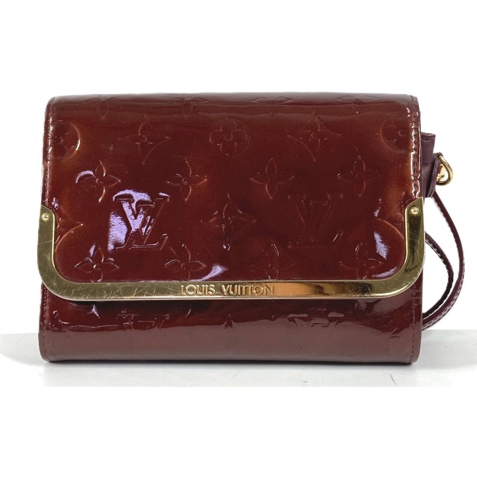 Louis Vuitton Clutch Bag Shoulder Bag Monogram Vernis Canvas: Louis Vuitton Clutch Bag Shoulder Bag Monogram Vernis Canvas Monogram Vernis canvas adds a touch of luxury to this Louis Vuitton shoulder bag, featuring the iconic purple and rouge fauviste colors.