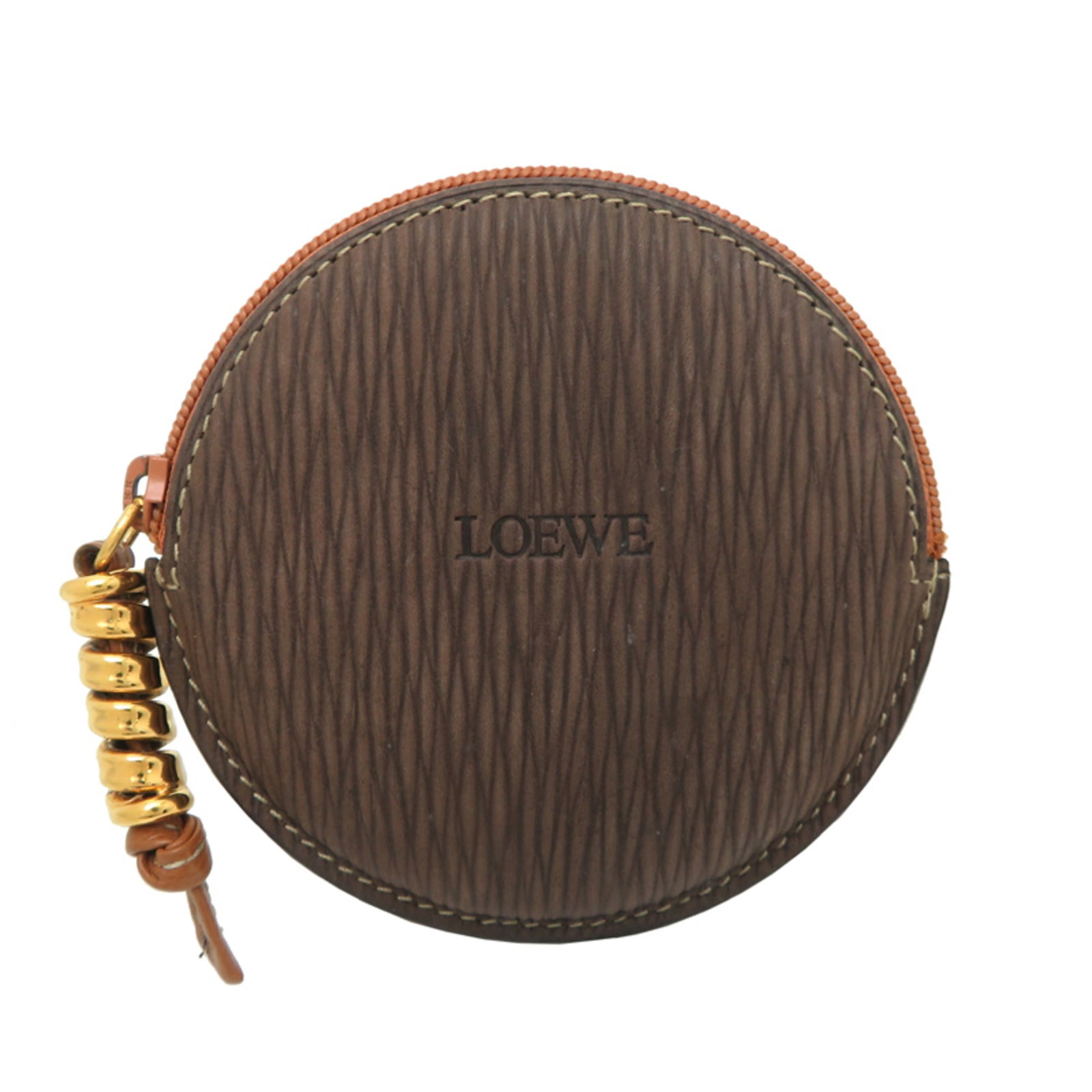 Loewe Coin Purse/ Coin Case Leather: Loewe Coin Purse/ Coin Case Leather The Loewe Coin Purse is a sleek and elegant leather accessory from Spain, featuring a rich brown finish and precise dimensions. Measuring 9cm x 9.5cm, this compact 