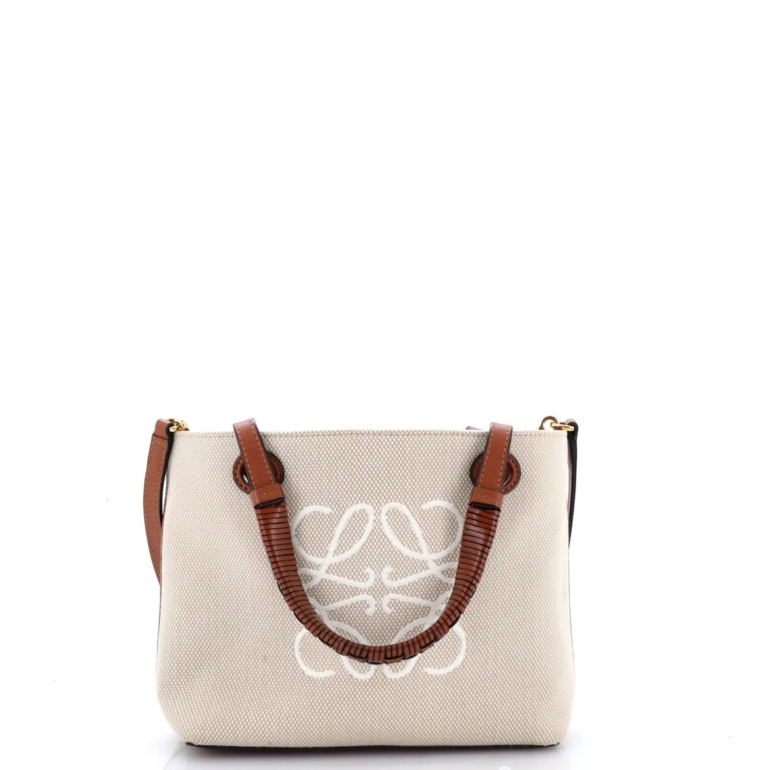 Loewe Tote Mini Basket Canvas Square: Loewe Tote Mini Basket Canvas Square The Loewe Tote Mini Basket Canvas Square is a stylish and versatile mini tote, measuring 7.5" tall, 9" wide, and 3" deep. Its neutral exterior color and canvas pla