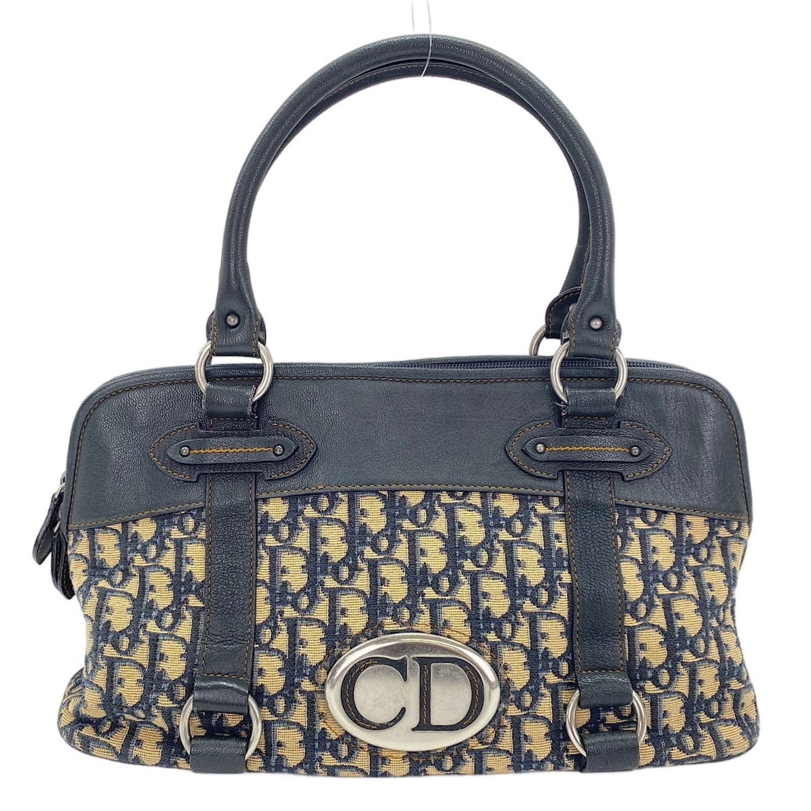 Christian Dior Christian Bag Trotter: Christian Dior Christian Bag Trotter The Christian Dior Christian Bag Trotter is a navy tote bag with a signature, measuring 18cm x 36.5cm x 10cm. Its strap length is 42.5cm, making it a practical