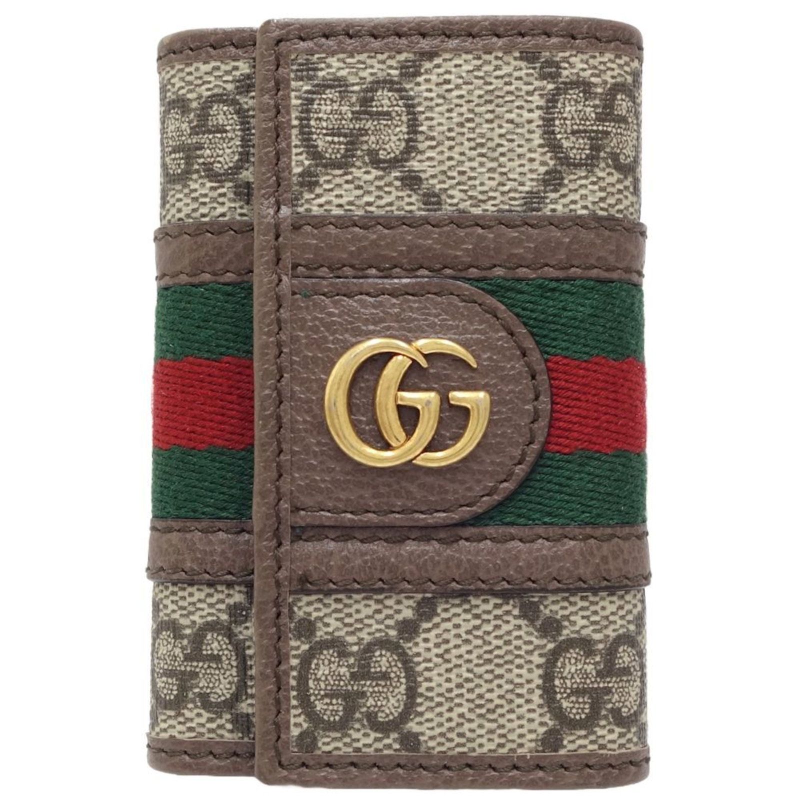 Canvas leather keycase by Gucci: Canvas leather keycase by Gucci Canvas leather keycase by Gucci, featuring a classic beige brown color and 6 key hooks, measures 6.5cm x 9.5cm x 2cm, making it a compact and stylish accessory for ever