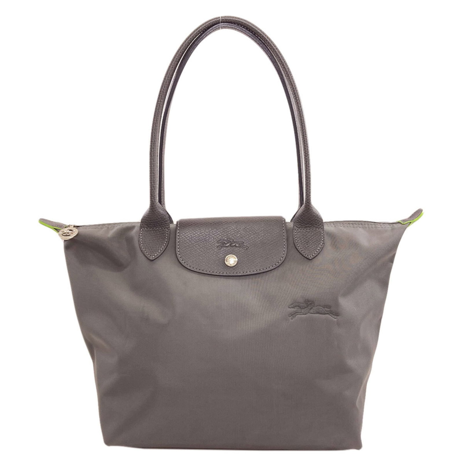 Nylon Longchamp Tote Bag: Nylon Longchamp Tote Bag Nylon Longchamp Tote Bag in Gray. This 26cm x 28cm x 16cm tote bag is made from durable nylon material. The bag's size and material make it a practical and versatile