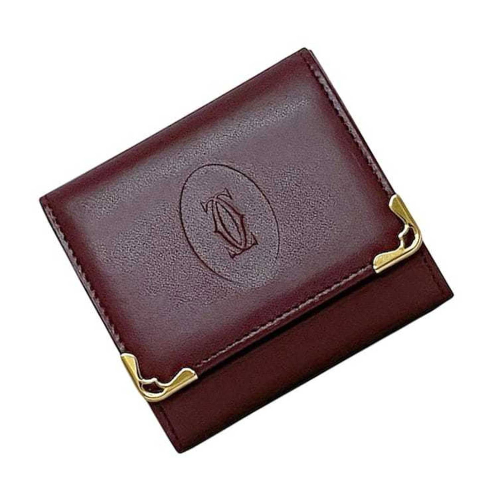 Coin Case Leather Purse Cartier: Coin Case Leather Purse Cartier Cartier's Bordeaux leather coin case is a sleek and sophisticated accessory, measuring 8cm x 8cm x 2cm. This beautifully crafted purse comes in a rich wine red color
