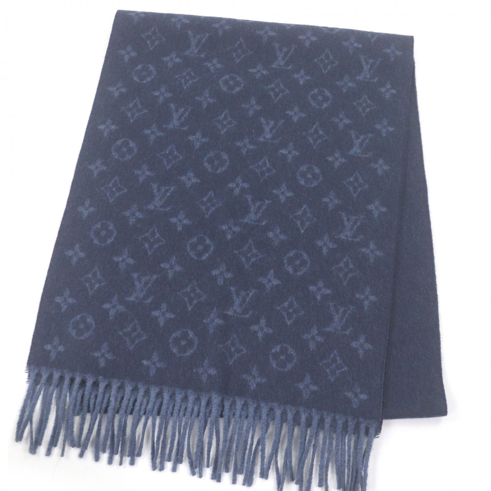 Louis Vuitton Stole Cashmere 50% Wool 50%: Louis Vuitton Stole Cashmere 50% Wool 50% The Louis Vuitton stole is a luxurious cashmere and wool blend garment, measuring 1.82m x 35.5cm, bearing a serial number of ff3272. This Italian-made item