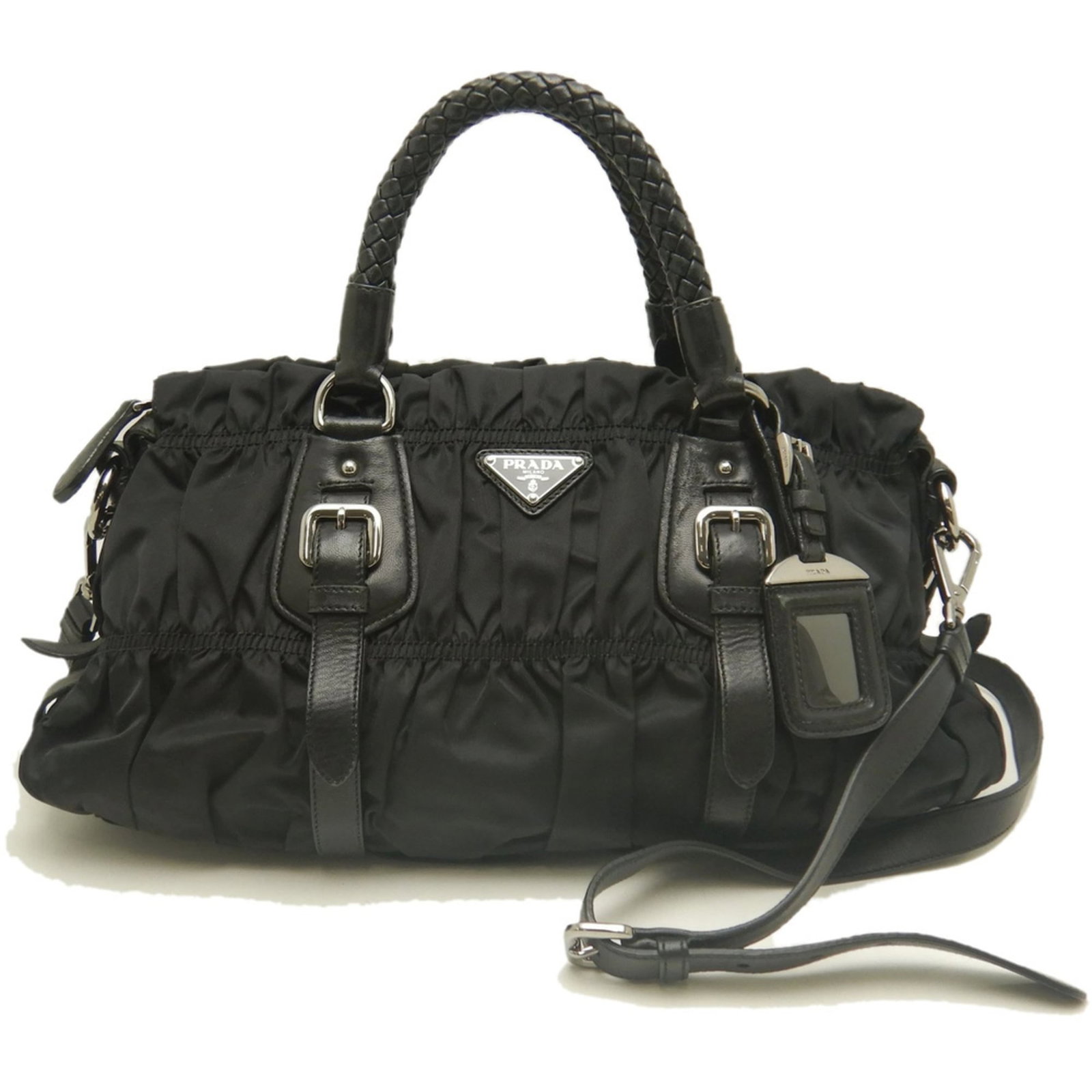 Nylon Prada Handbag: Nylon Prada Handbag Nylon Prada Handbag, BN1407, features a sleek and modern design with a Nero color that adds a touch of sophistication. Made from high-quality nylon, this handbag measures 20cm x 40