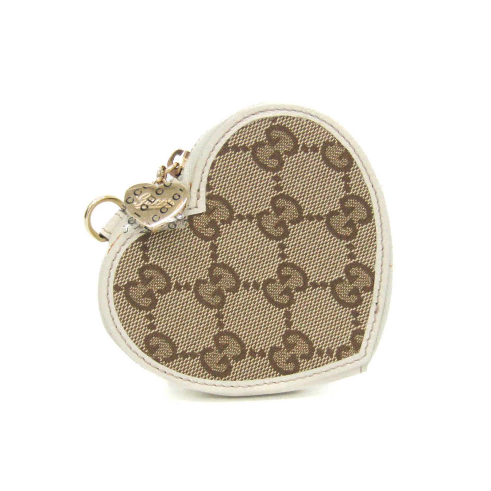 Gucci Coin Purse Coin Case Gg Canvas Leather: Gucci Coin Purse Coin Case Gg Canvas Leather Gucci's iconic Heart motif coin purse is a stylish accessory that combines GG canvas and leather in a sleek, beige and off-white design. The coin case