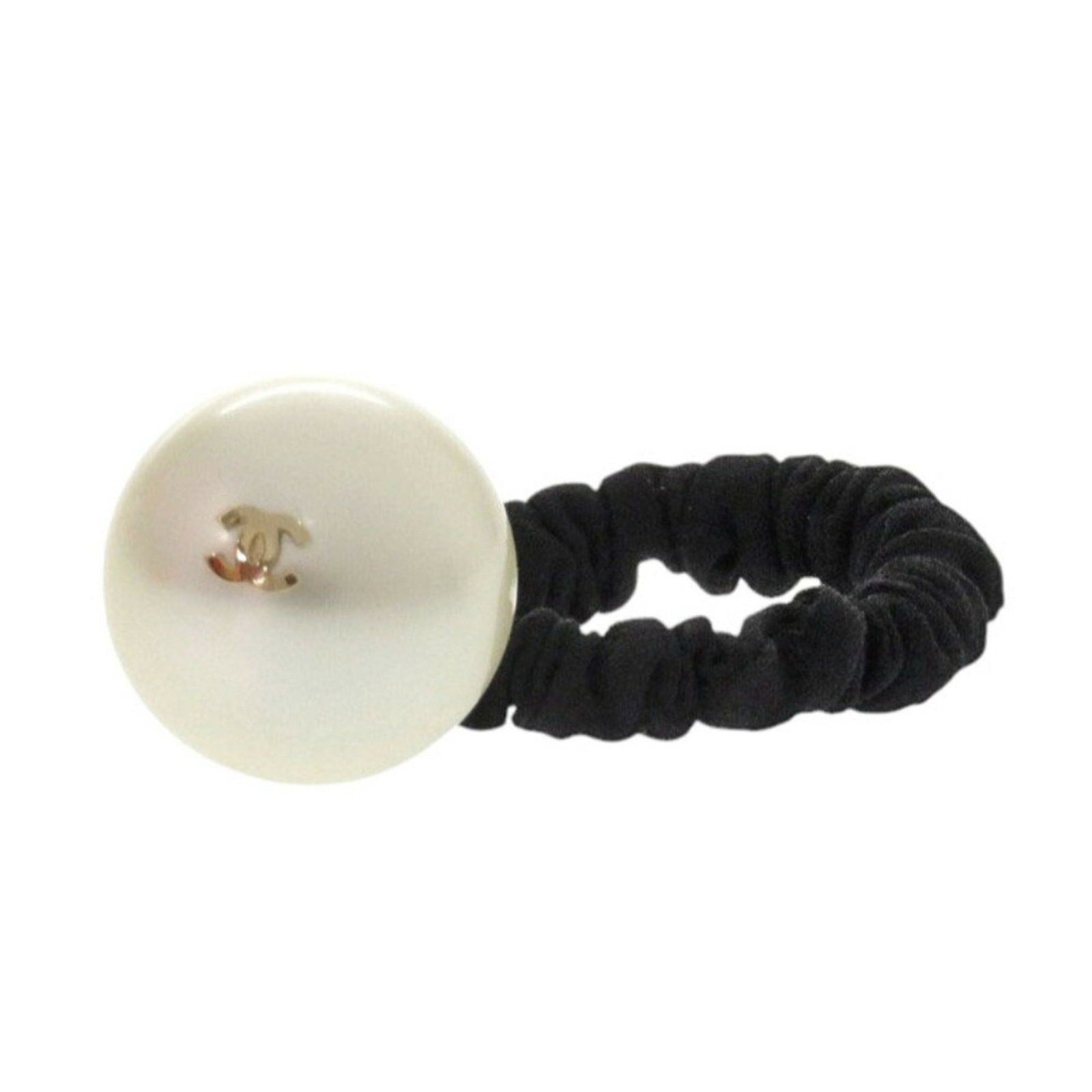 Hair Tie By Chanel: Hair Tie By Chanel This black hair tie from Chanel features a sleek design with a gold accent, adding a touch of luxury to any hairstyle. The tie measures 9.5cm in length and 3.74'' in width, while th