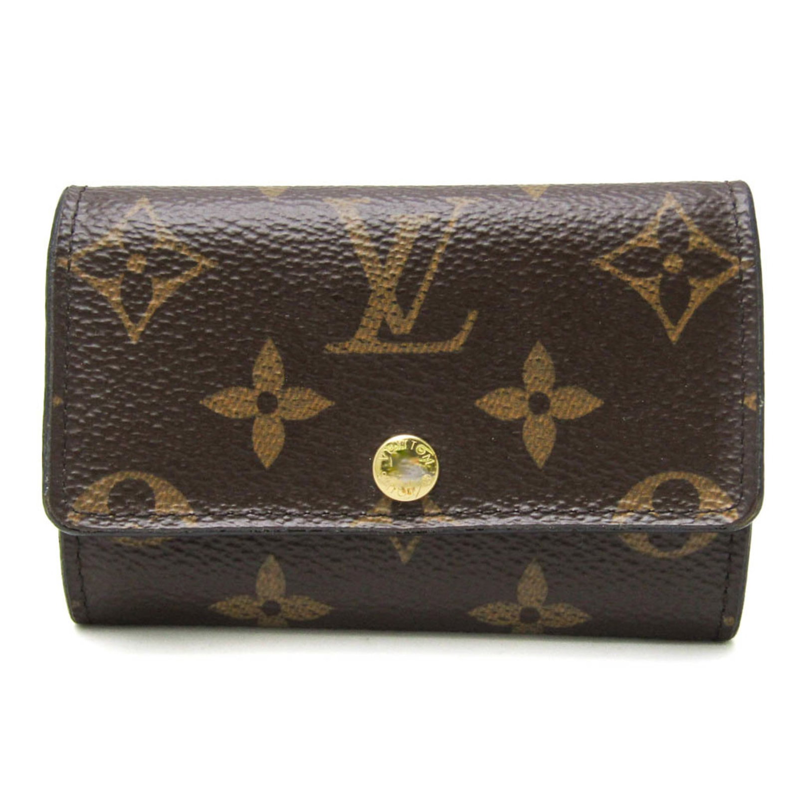 Keycase Monogram Louis Vuitton: Keycase Monogram Louis Vuitton Snap closure and iconic monogram pattern make this Louis Vuitton Monogram keycase a stylish accessory for everyday use. With six key hooks and a compact design, it's