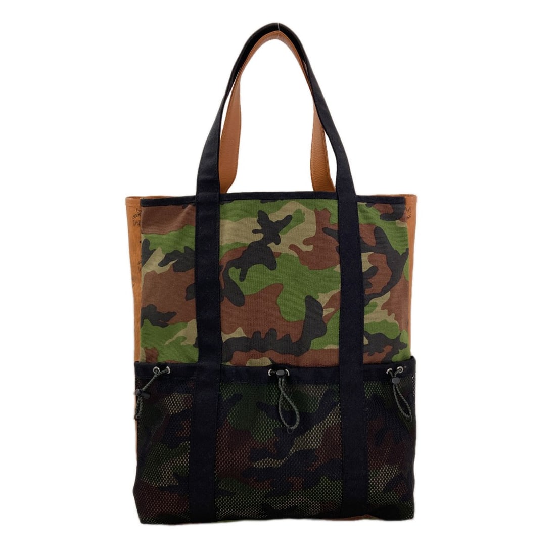 Camouflage Pattern Leather Canvas Tote Bag Mcm: Camouflage Pattern Leather Canvas Tote Bag Mcm Brown leather canvas tote bag with a camouflage pattern, made from high-quality leather and canvas. The bag's distinctive camouflage design makes it a
