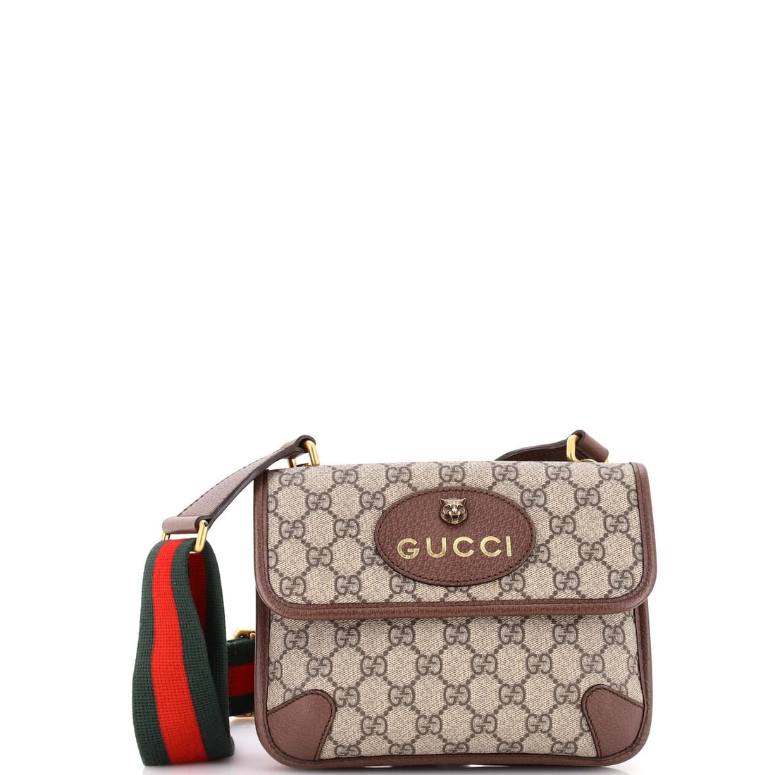 Small canvas messenger flap coated GG Gucci: Small canvas messenger flap coated GG Gucci Small canvas messenger flap coated GG Gucci bag in brown, featuring a classic cross body design with a neutral interior and aged gold hardware. The bag's