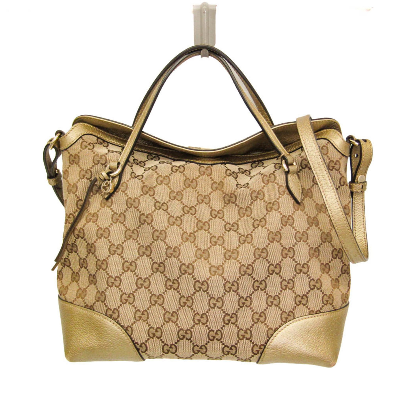 Shoulder Bag Gg Canvas Leather Handbag Gucci: Shoulder Bag Gg Canvas Leather Handbag Gucci The Gucci GG Canvas Leather Handbag Bree is a stylish shoulder bag featuring GG canvas and leather materials, with a beige and gold color combination. It
