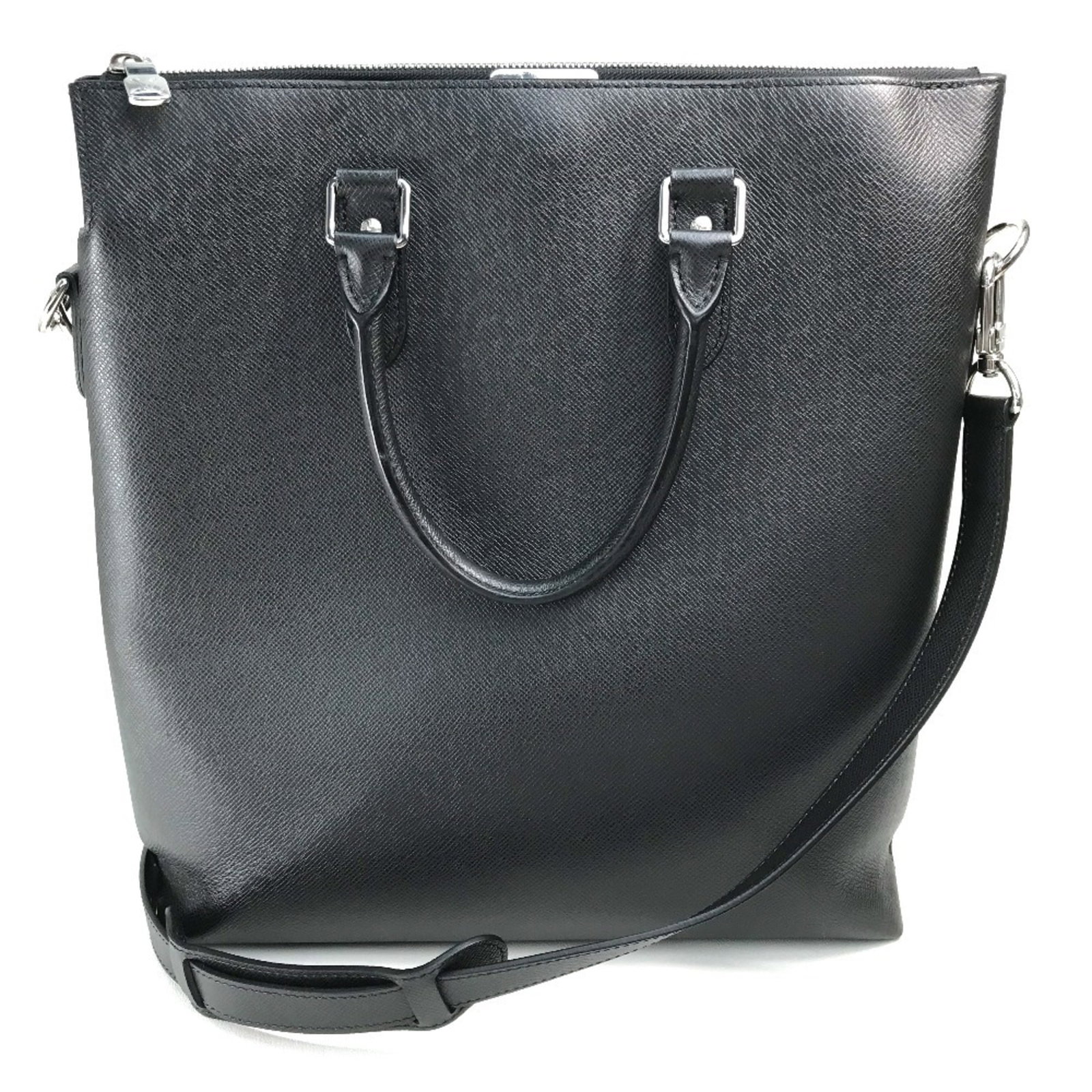 Vuitton Handbag Leather Taiga Shoulder Bag: Vuitton Handbag Leather Taiga Shoulder Bag The Louis Vuitton Line Taiga Shoulder Bag is a sleek and sophisticated accessory made from high-quality Taiga leather, featuring a classic design with clean