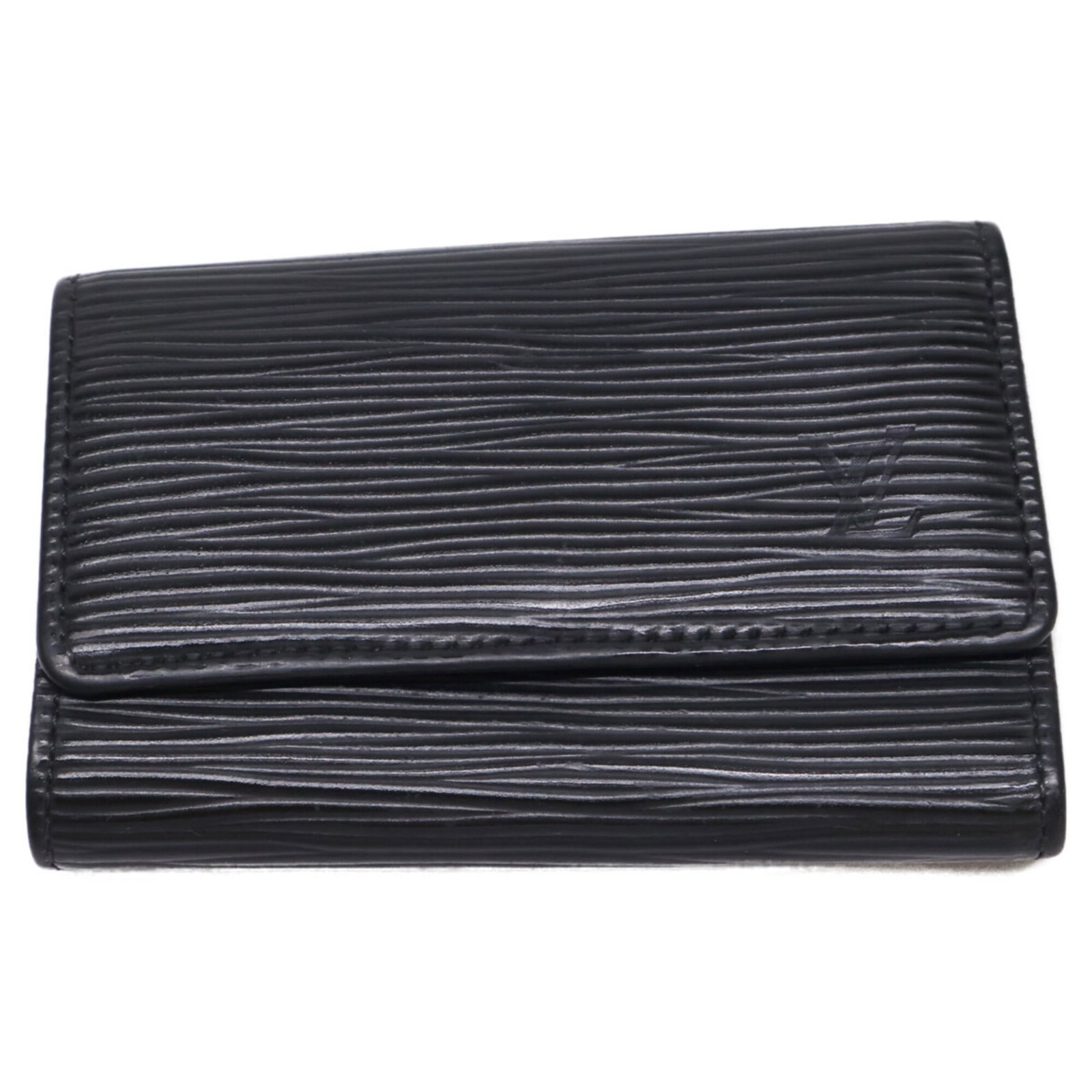 Keycase Leather Epi Louis Vuitton: Keycase Leather Epi Louis Vuitton Keycase Leather Epi Louis Vuitton is made from Epi leather, a signature material of Louis Vuitton. The item measures 11cm x 7cm x 1cm and features a black color.