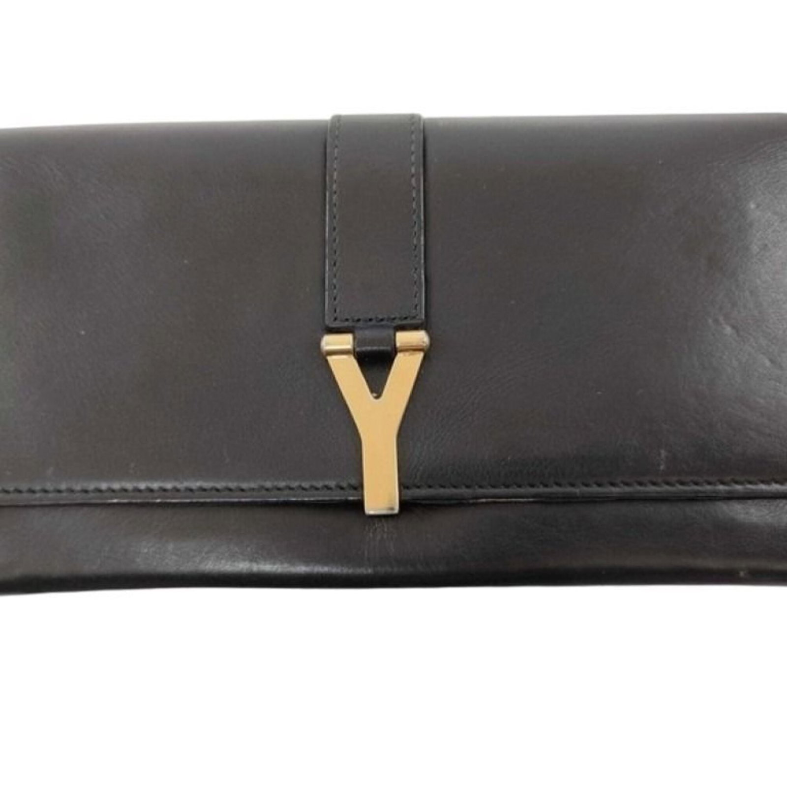 Saint Laurent Wallet Bi-Fold Leather: Saint Laurent Wallet Bi-Fold Leather Brown leather bi-fold wallet from Yves Saint Laurent, featuring a classic design with clean lines and a sleek finish. Made from high-quality leather, this wallet
