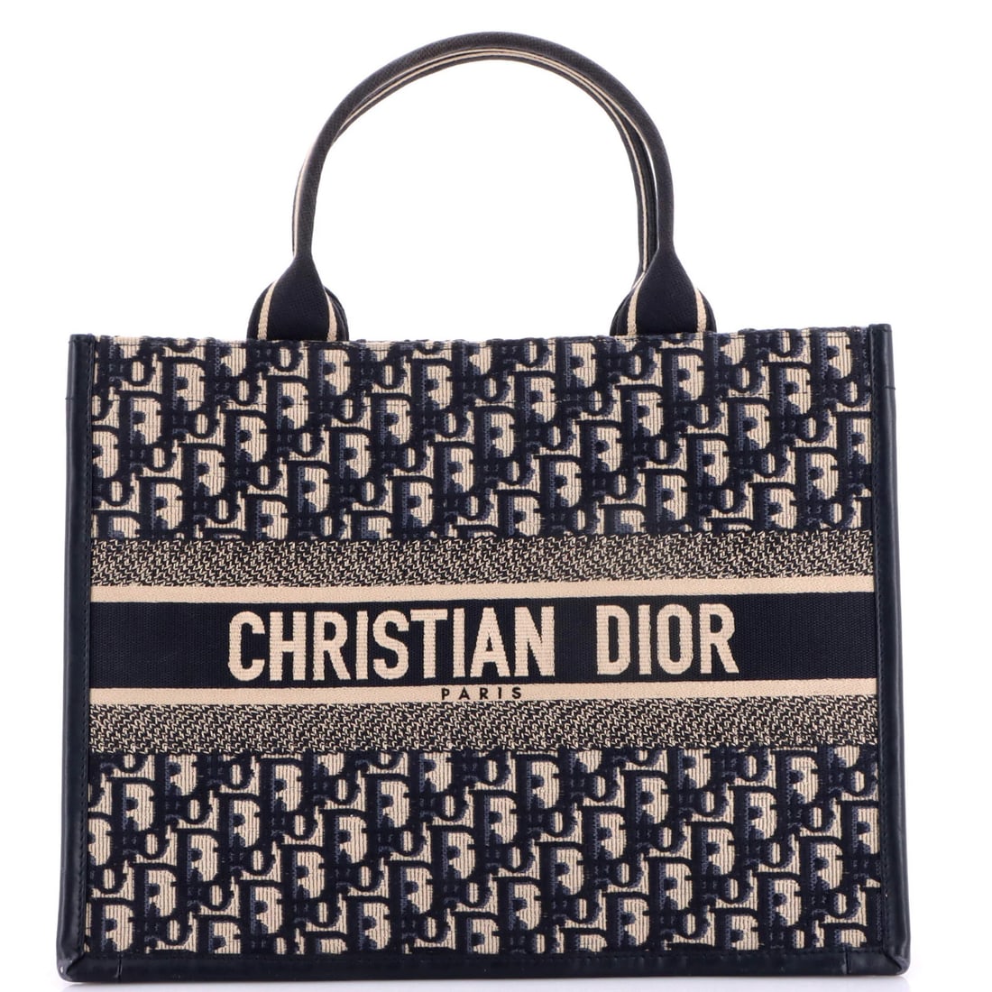 Oblique Canvas Medium Book Dior Strap Christian Tote: Oblique Canvas Medium Book Dior Strap Christian Tote Oblique Canvas Medium Book Dior Strap Christian Tote is a medium-sized tote with a distinctive oblique canvas exterior in blue print, featuring a