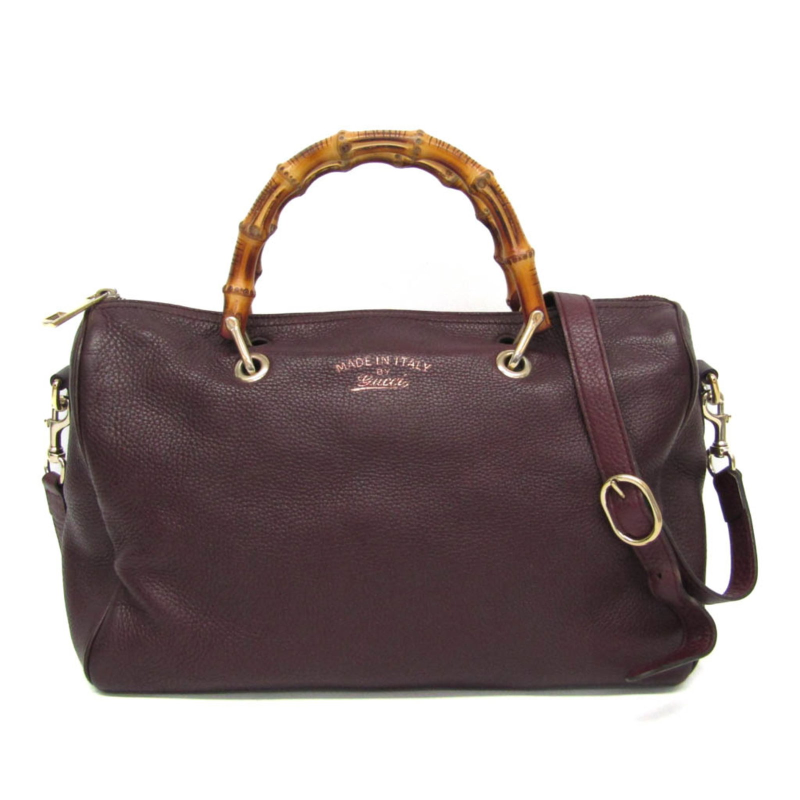 Handbag Leather Gucci: Handbag Leather Gucci Wine-colored Gucci handbag made from high-quality leather, featuring a classic design with a zipper closure, two zipper pockets, and an open pocket. The bag measures 21cm x 33cm 