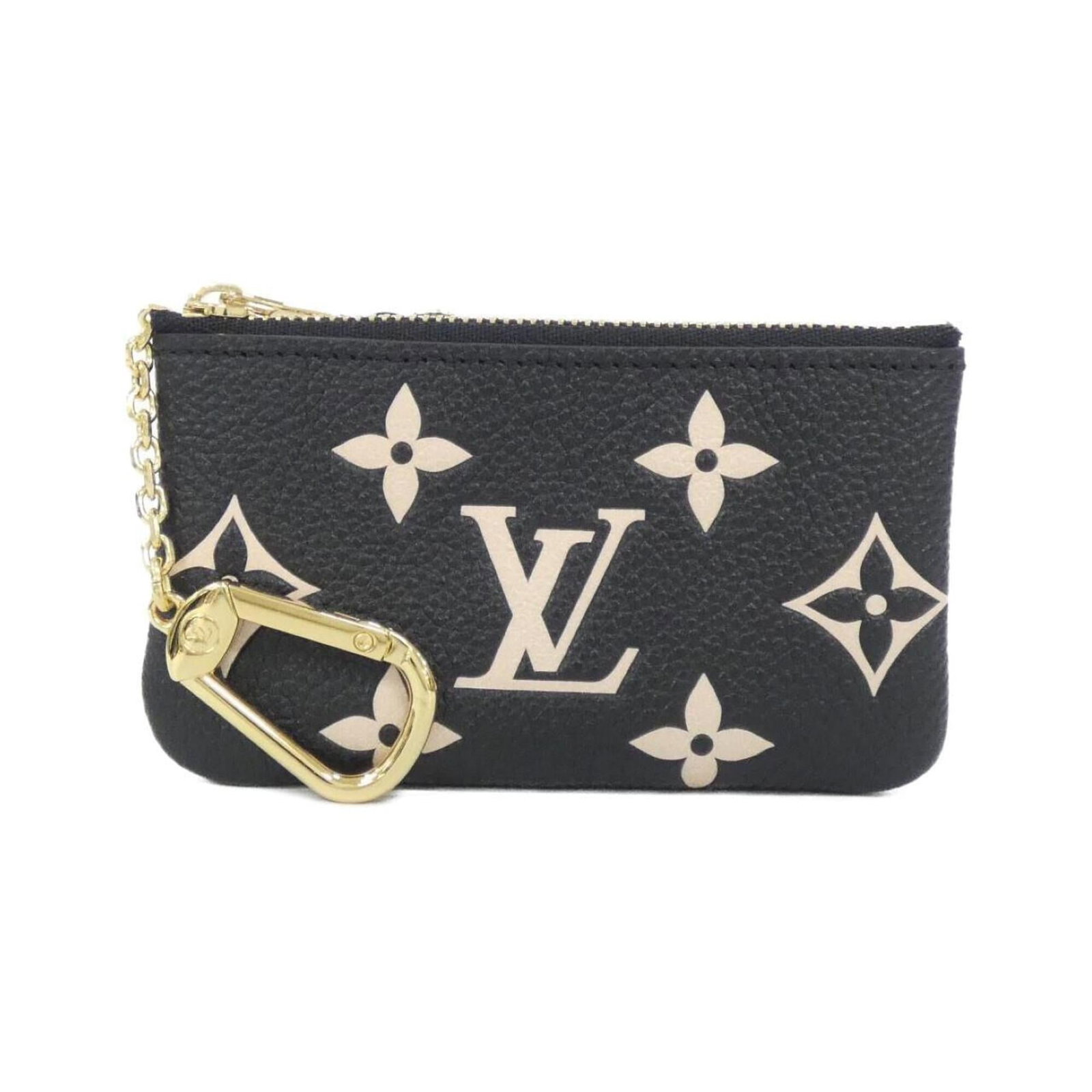 Louis Vuitton Purse Coin Case Leather: Louis Vuitton Purse Coin Case Leather The Louis Vuitton Purse Coin Case Leather is a sleek and stylish accessory, made from high-quality leather in a classic beige and black color combination. Measuri