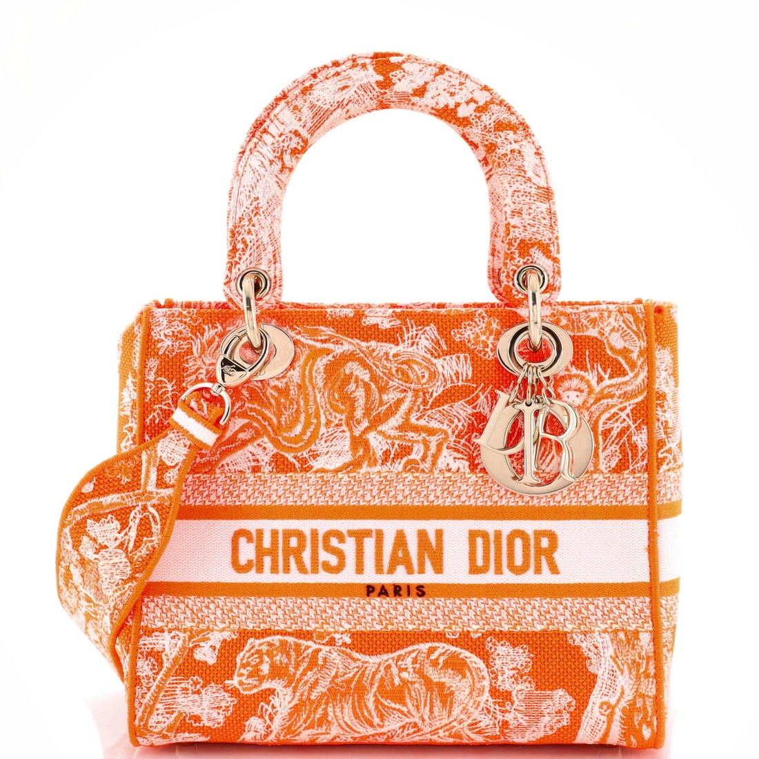 Lady Dior Toile de Jouy Christian D-Lite Embroidered Canvas Bag: Lady Dior Toile de Jouy Christian D-Lite Embroidered Canvas Bag The Lady Dior Toile de Jouy Christian D-Lite Embroidered Canvas Bag boasts a vibrant orange and white exterior, adorned with the iconic