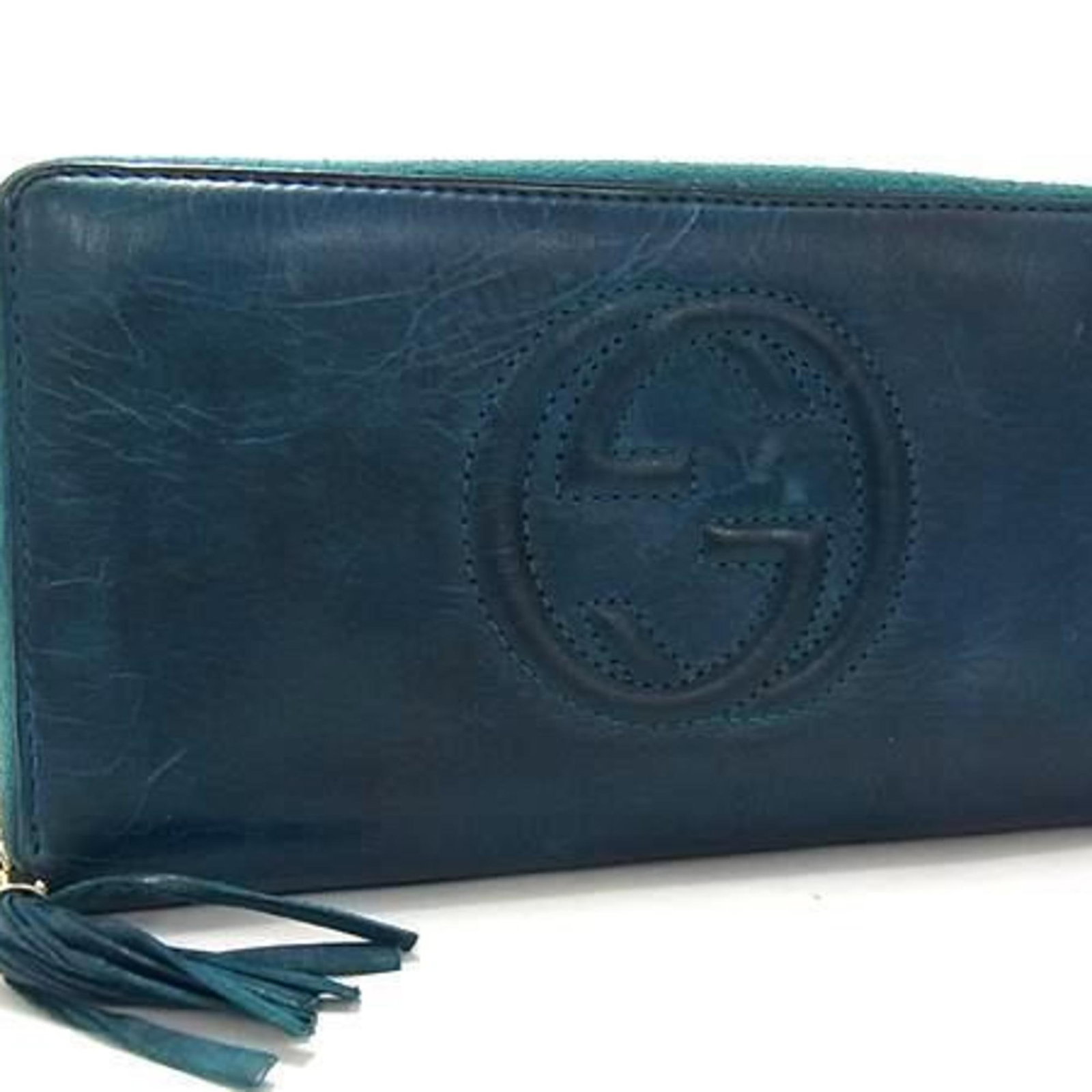 Gucci Long Wallet (Bi-Fold) Leather: Gucci Long Wallet (Bi-Fold) Leather Blue green Gucci Long Wallet (Bi-Fold) Leather, made from high-quality leather, features a classic bi-fold design with a size of 10cm x 19cm x 2.5cm. This stylish