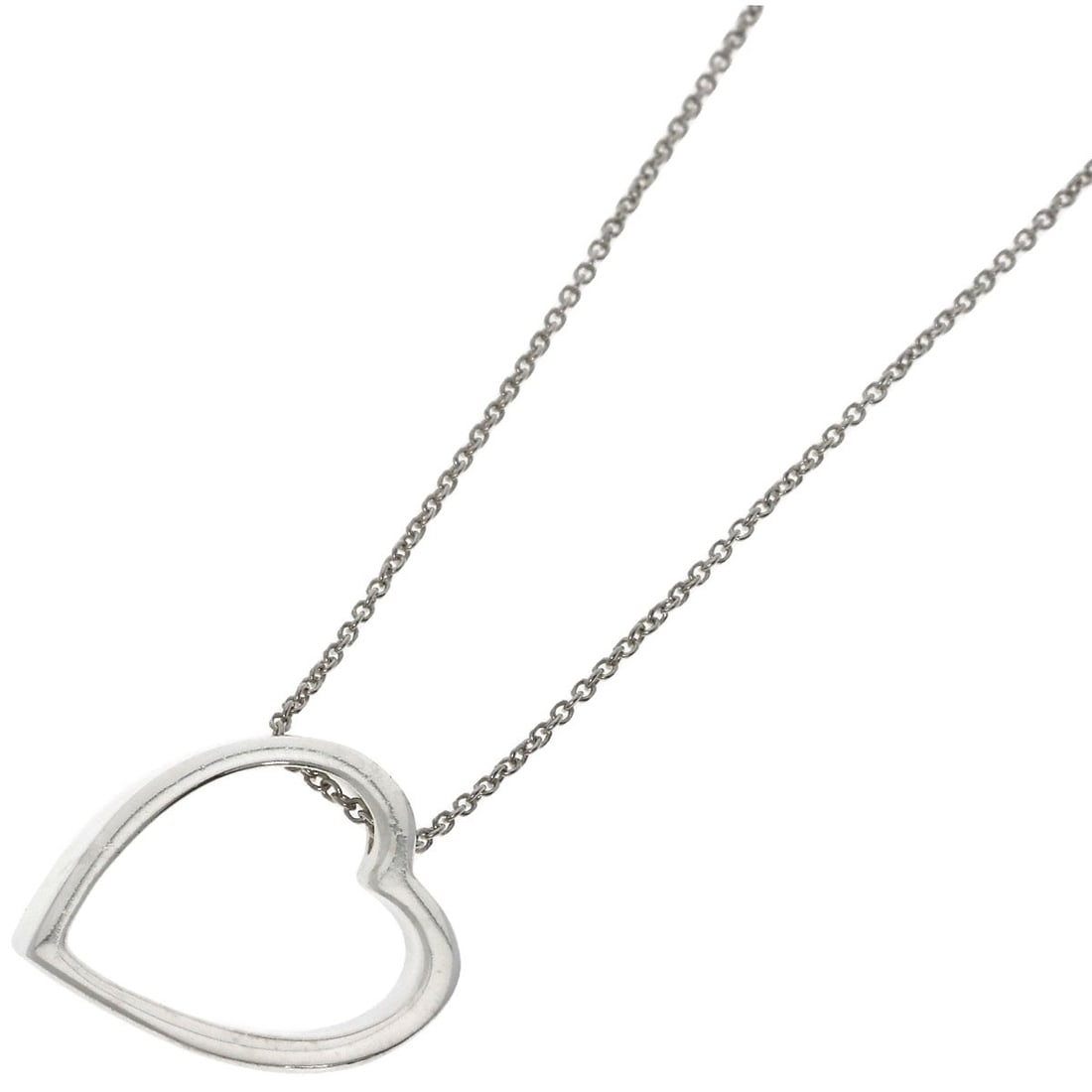 Tiffany Co Geometric Heart Necklace in Silver: Tiffany Co Geometric Heart Necklace in Silver The Tiffany Co Geometric Heart Necklace in Silver is a striking piece featuring a geometric design in silver metal. This necklace measures 15.9 inches in