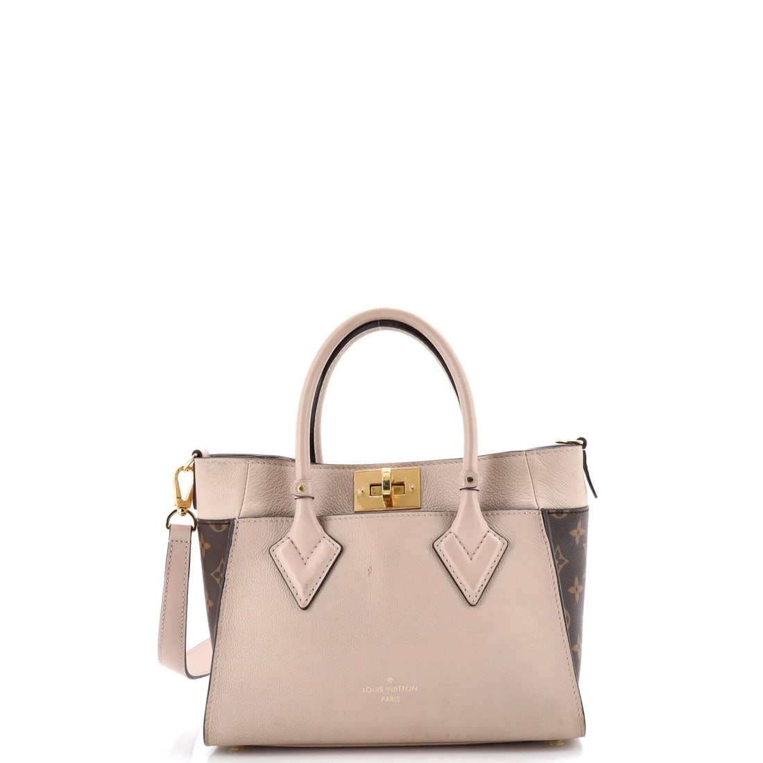 Louis Vuitton On My Side Tote Leather with Monogram Canvas PM: Louis Vuitton On My Side Tote Leather with Monogram Canvas PM Canvas Coated Leather exterior and Monogram Canvas PM interior make this Louis Vuitton On My Side Tote a stylish and durable choice. With