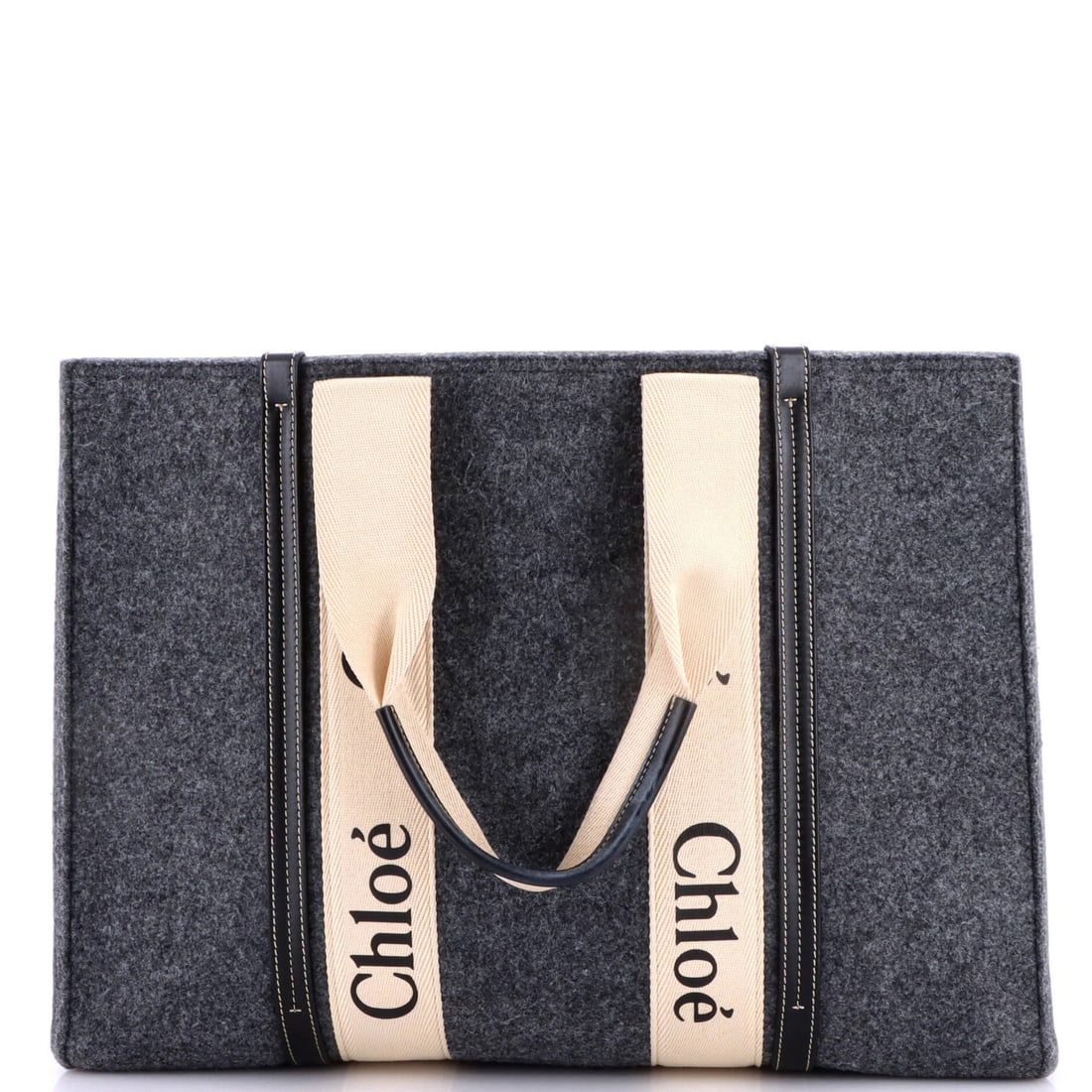 Large Chloe Woody Recycled Felt Tote Canvas Leather: Large Chloe Woody Recycled Felt Tote Canvas Leather Large Chloe Woody Recycled Felt Tote Canvas Leather features a unique combination of recycled felt, leather, and canvas materials. The gray exterior