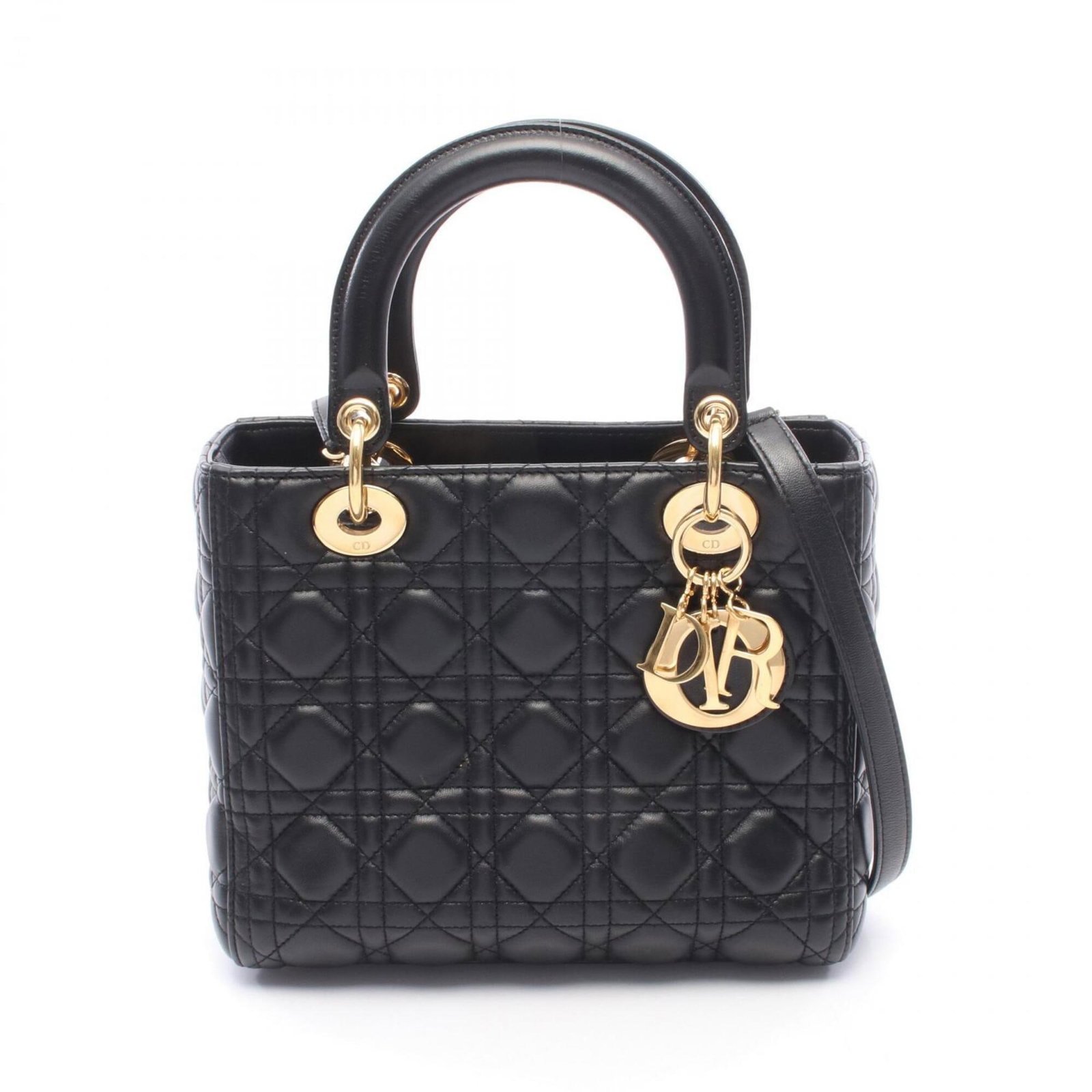 Handbag Leather Dior Christian: Handbag Leather Dior Christian This black leather handbag from Christian Dior measures 20cm x 24cm x 11cm and features a classic design. Made from high-quality leather, its sleek silhouette makes it